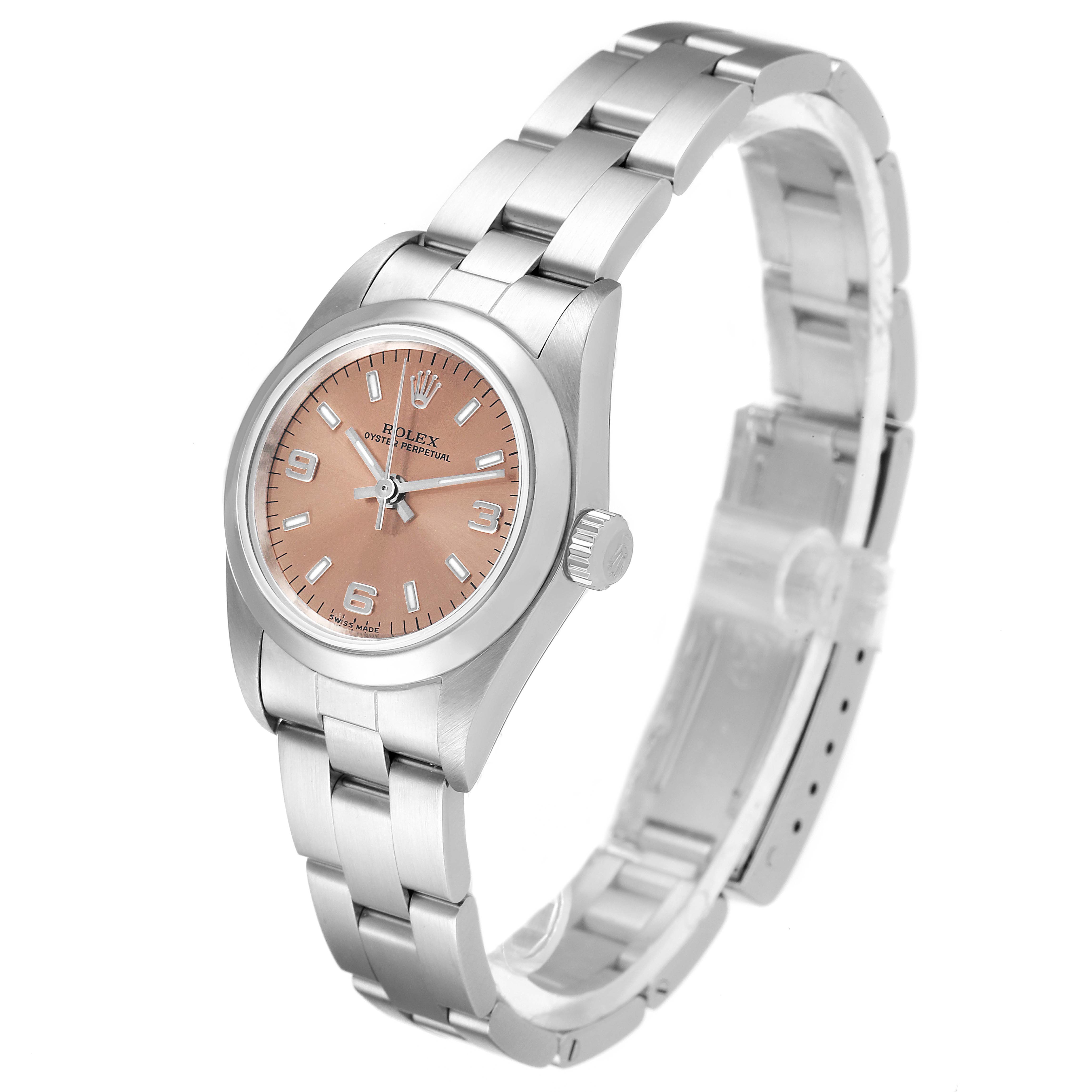 This image shows a Rolex Oyster Perpetual 76080 Women
s Stainless Steel Pink Dial 76080 Women
s Stainless Steel Pink Dial watch at a three-quarter angle, highlighting the face, band, and crown.