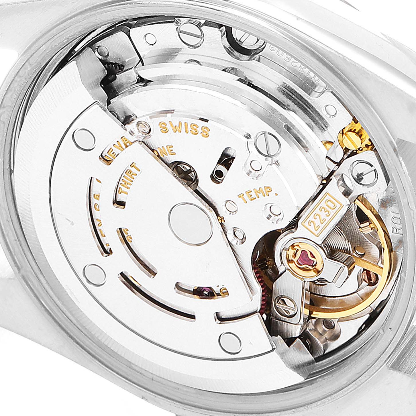 The image shows the inner mechanism and movement of a Rolex Oyster Perpetual 76080 Women
s Stainless Steel Pink Dial 76080 Women
s Stainless Steel Pink Dial watch from a rear, close-up angle.