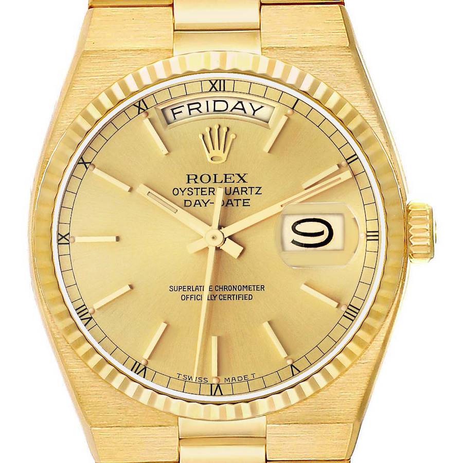 The image shows a front view of a Rolex Oysterquartz 19018 Men's Yellow Gold Champagne Dial watch, highlighting the dial, day-date display, and fluted bezel.