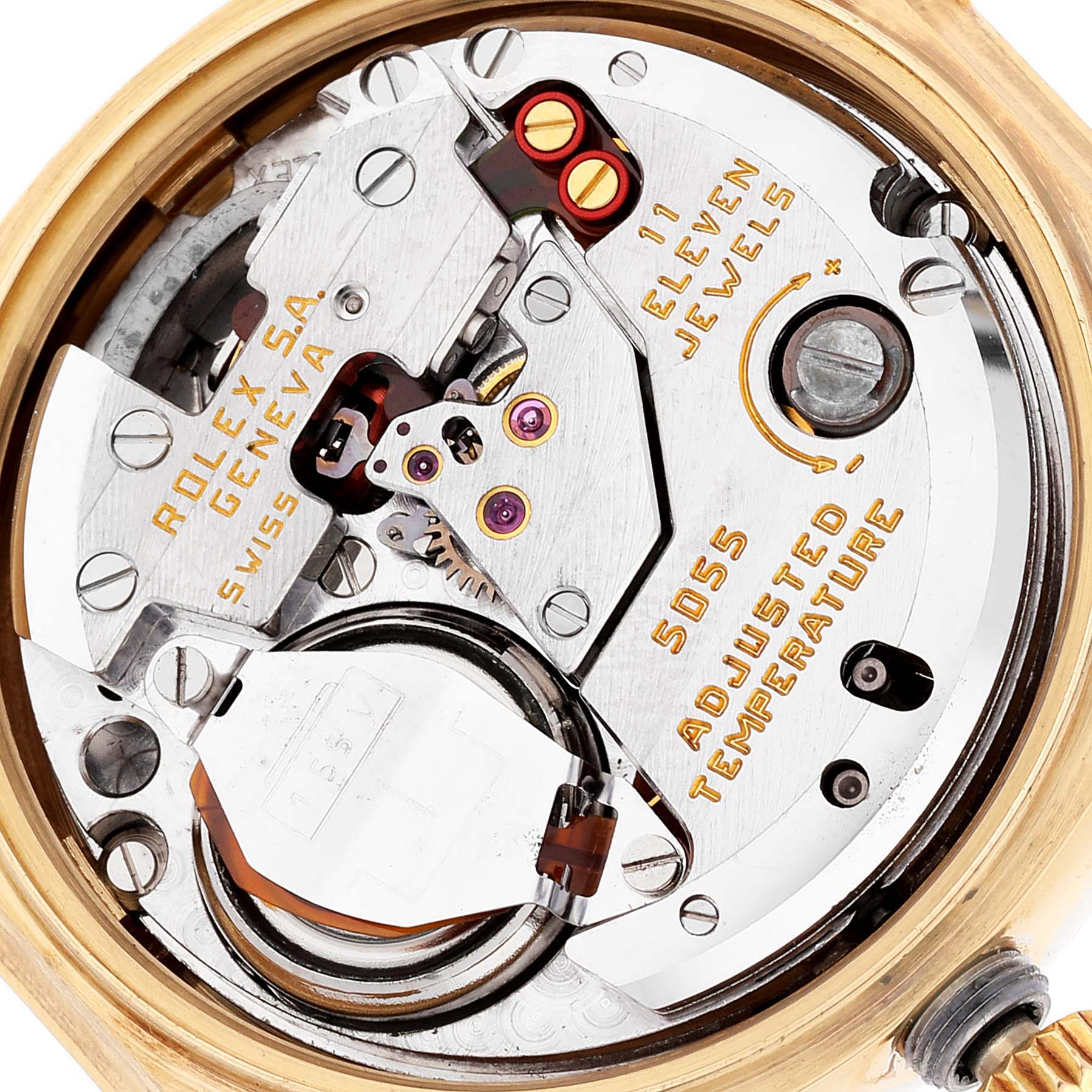 The image shows the inner mechanics of a Rolex Oysterquartz 19018 Men's Yellow Gold Black Dial 19018 Men's Yellow Gold Black Dial watch, highlighting the movement and components from a close-up angle.