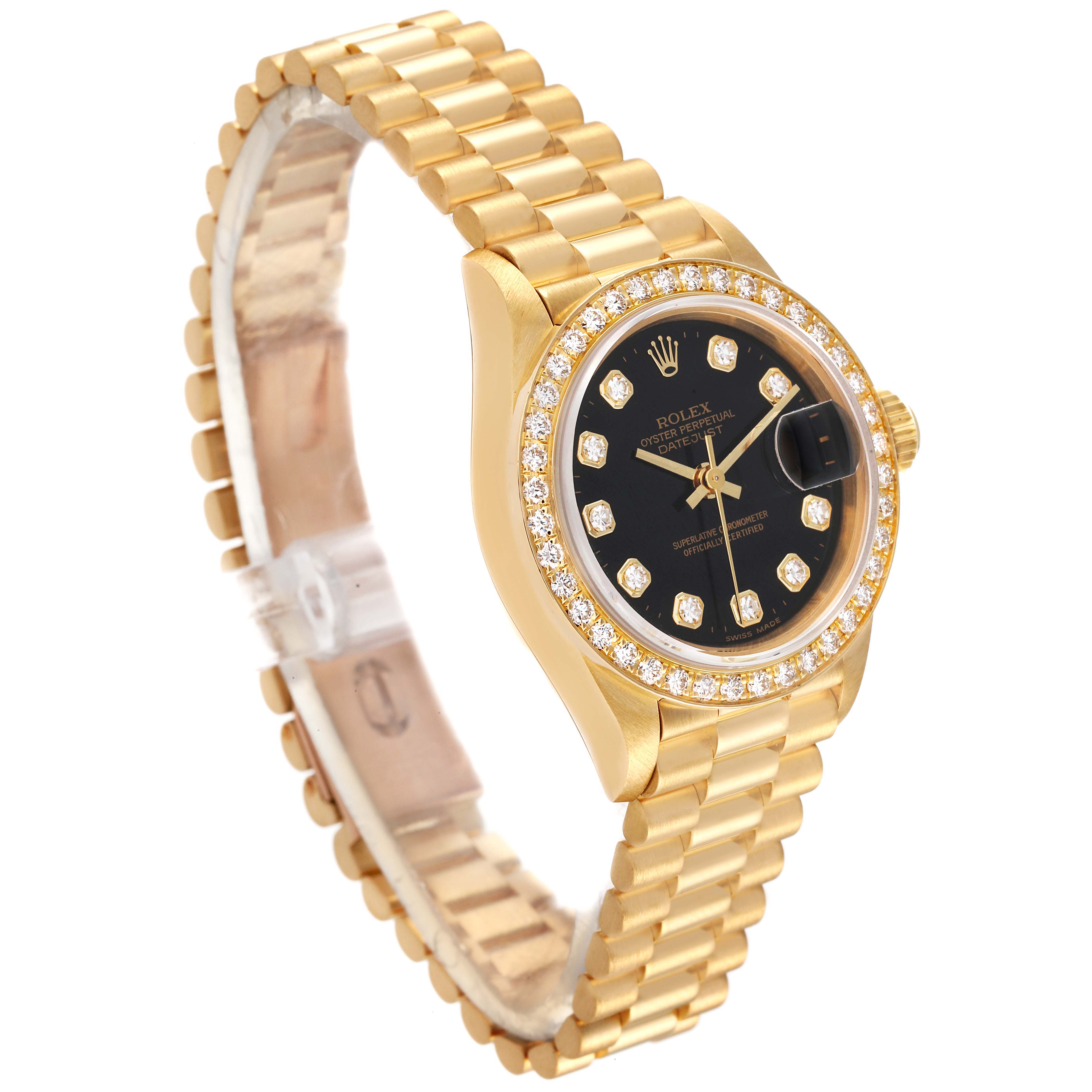 The image shows a Rolex President 69138 Women's Yellow Gold Black Dial 69138 Women's Yellow Gold Black Dial watch at a three-quarter angle, highlighting its gold band, black dial, and diamond-encrusted bezel.