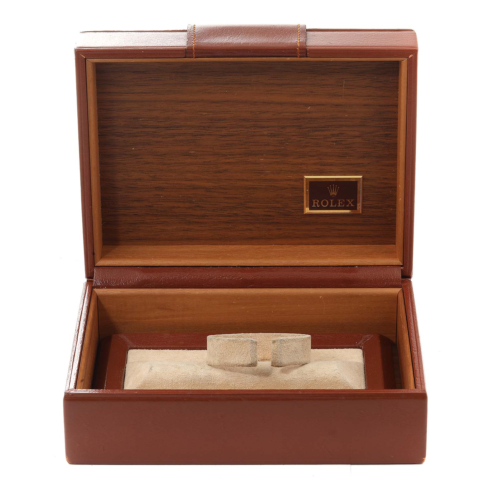 This image shows an open Rolex box for the President model, featuring the logo and an empty cushion for the watch.