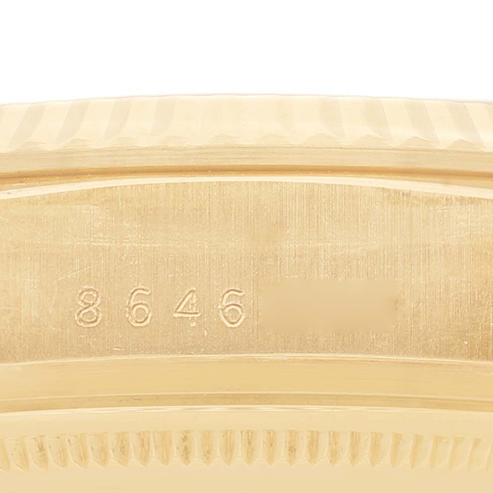 This image shows a close-up of the serial number engraved on the case side of a Rolex President 18038 Men
s Yellow Gold Champagne Dial 18038 Men
s Yellow Gold Champagne Dial model watch.