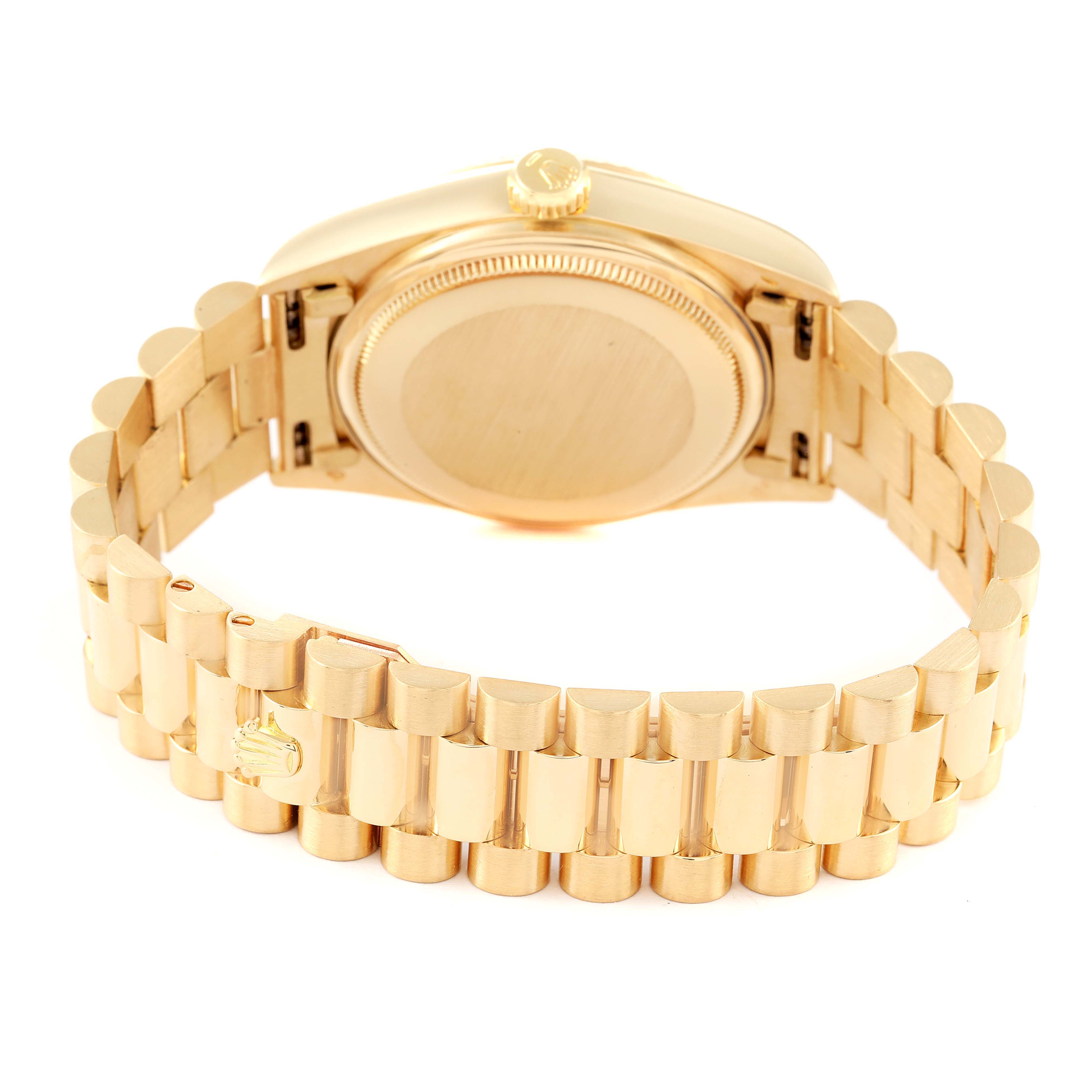 The image shows the backside and bracelet of a Rolex President 18038 Men
s Yellow Gold Champagne Dial 18038 Men
s Yellow Gold Champagne Dial model watch at an angle highlighting the clasp and case back.