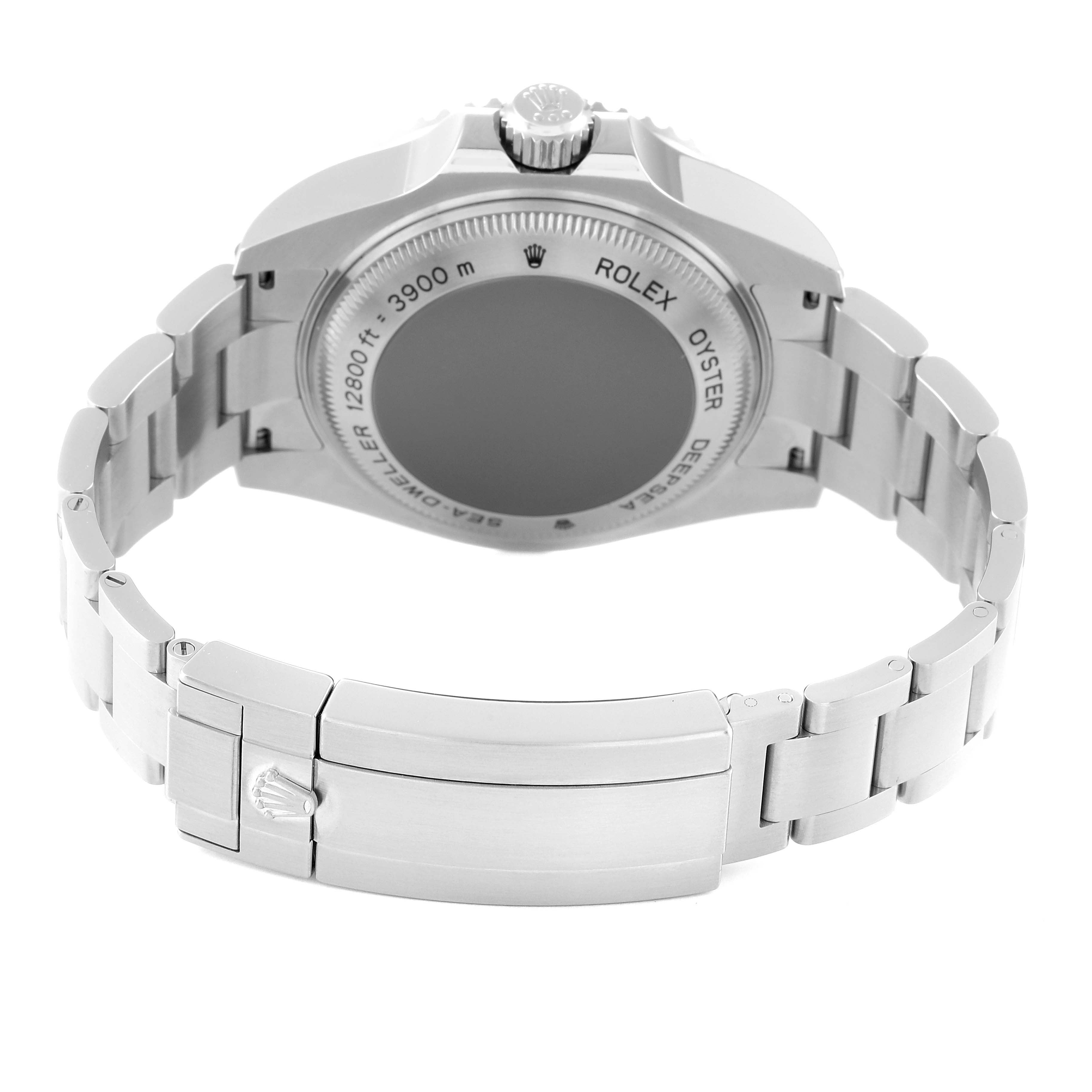 This Rolex Sea-Dweller 116660 Men's Stainless Steel Blue Dial 116660 Men's Stainless Steel Blue Dial watch is shown from the back, highlighting the case back, crown, and metal bracelet with the clasp.