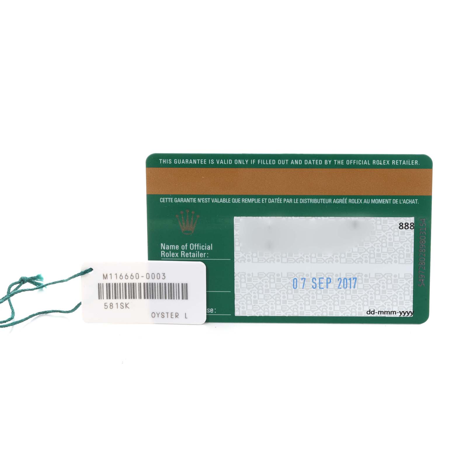 The image shows the warranty card and tag of a Rolex Sea-Dweller 116660 Men's Stainless Steel Blue Dial 116660 Men's Stainless Steel Blue Dial watch, displayed from above.