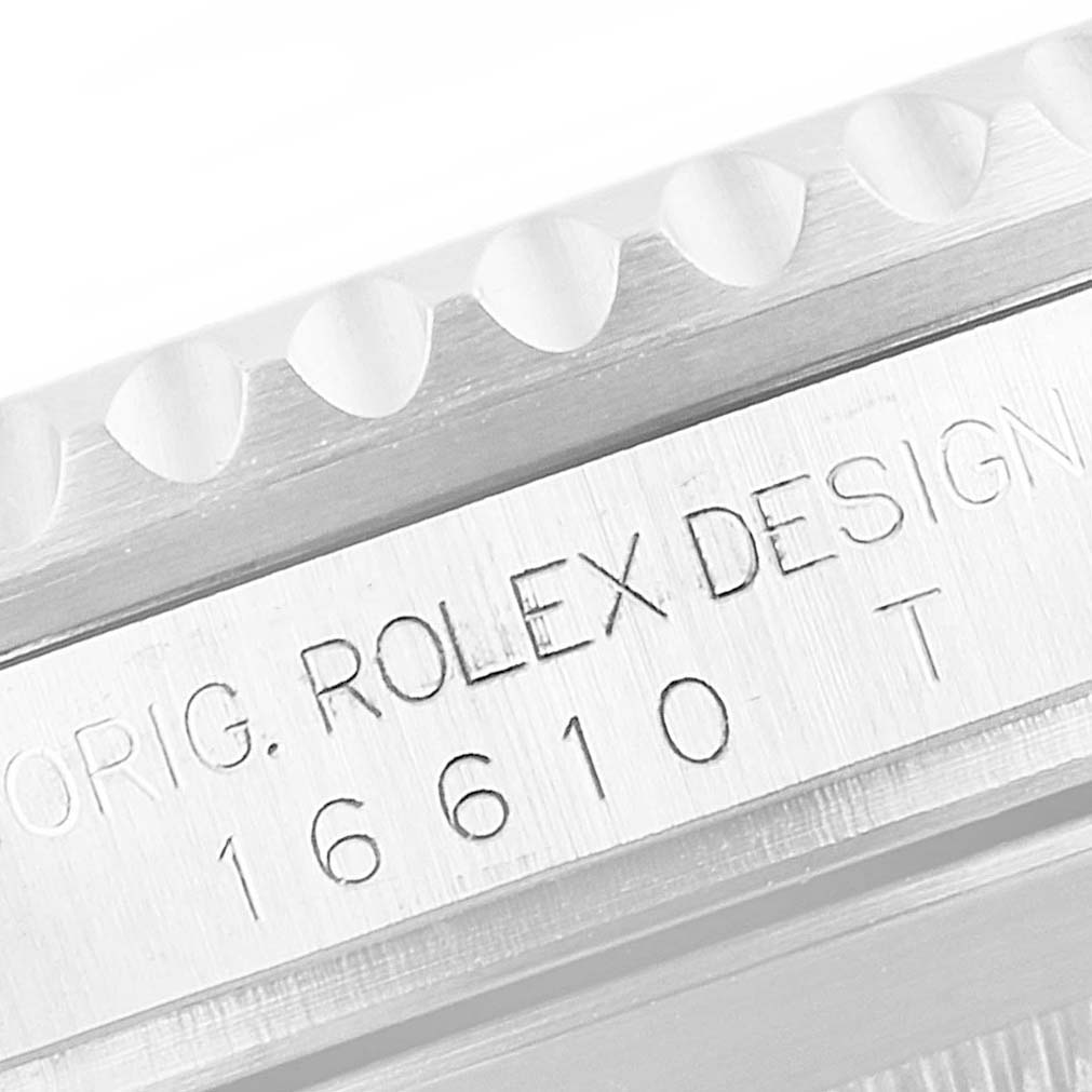 This image shows a close-up of the case side engraving on a Rolex Submariner 16610 Men
s Stainless Steel Black Dial 16610 Men
s Stainless Steel Black Dial 16610 watch.