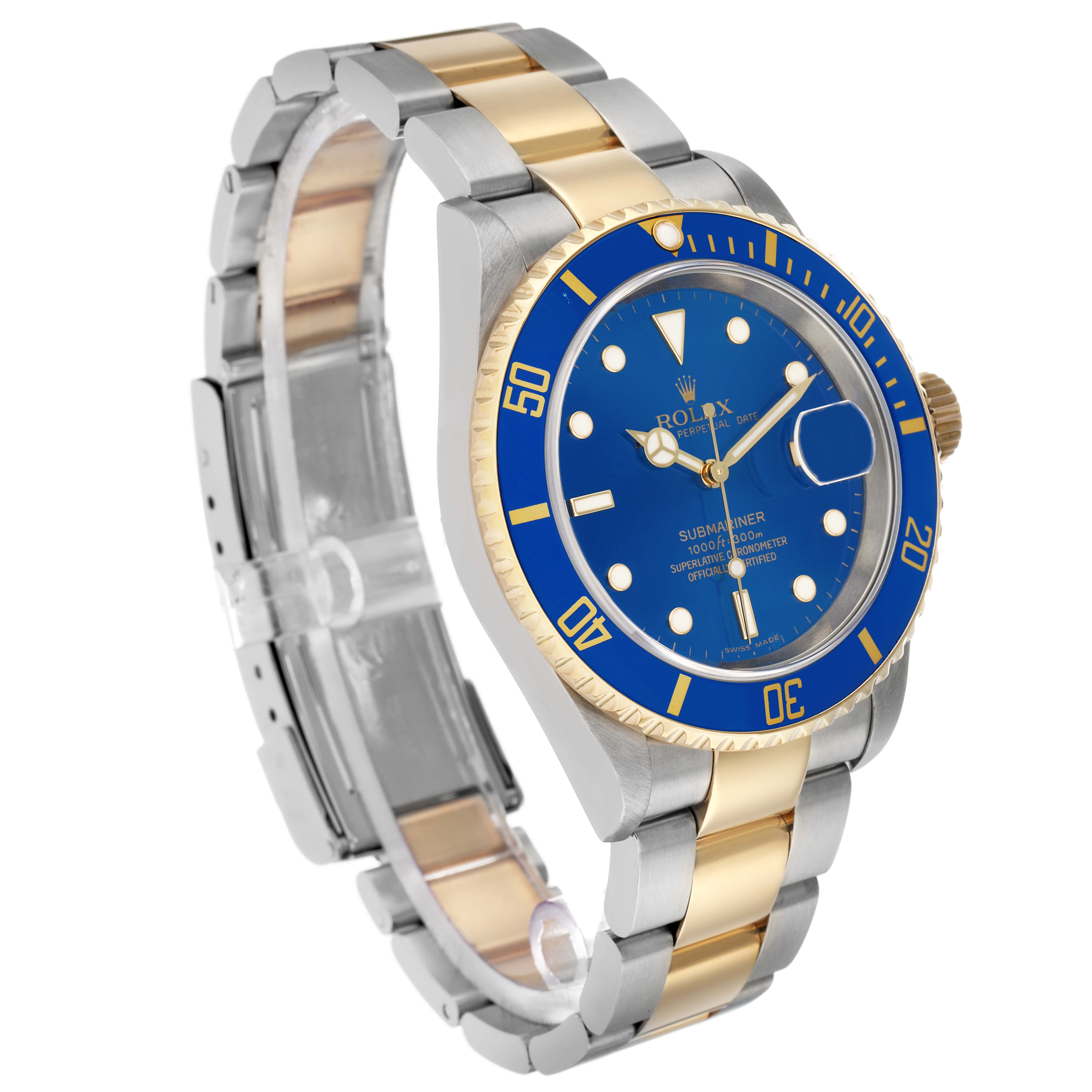 The Rolex Submariner 16613 Men's Steel and Gold (two tone) Blue Dial watch is shown at a three-quarter angle, highlighting its blue dial, bezel, and two-tone bracelet.