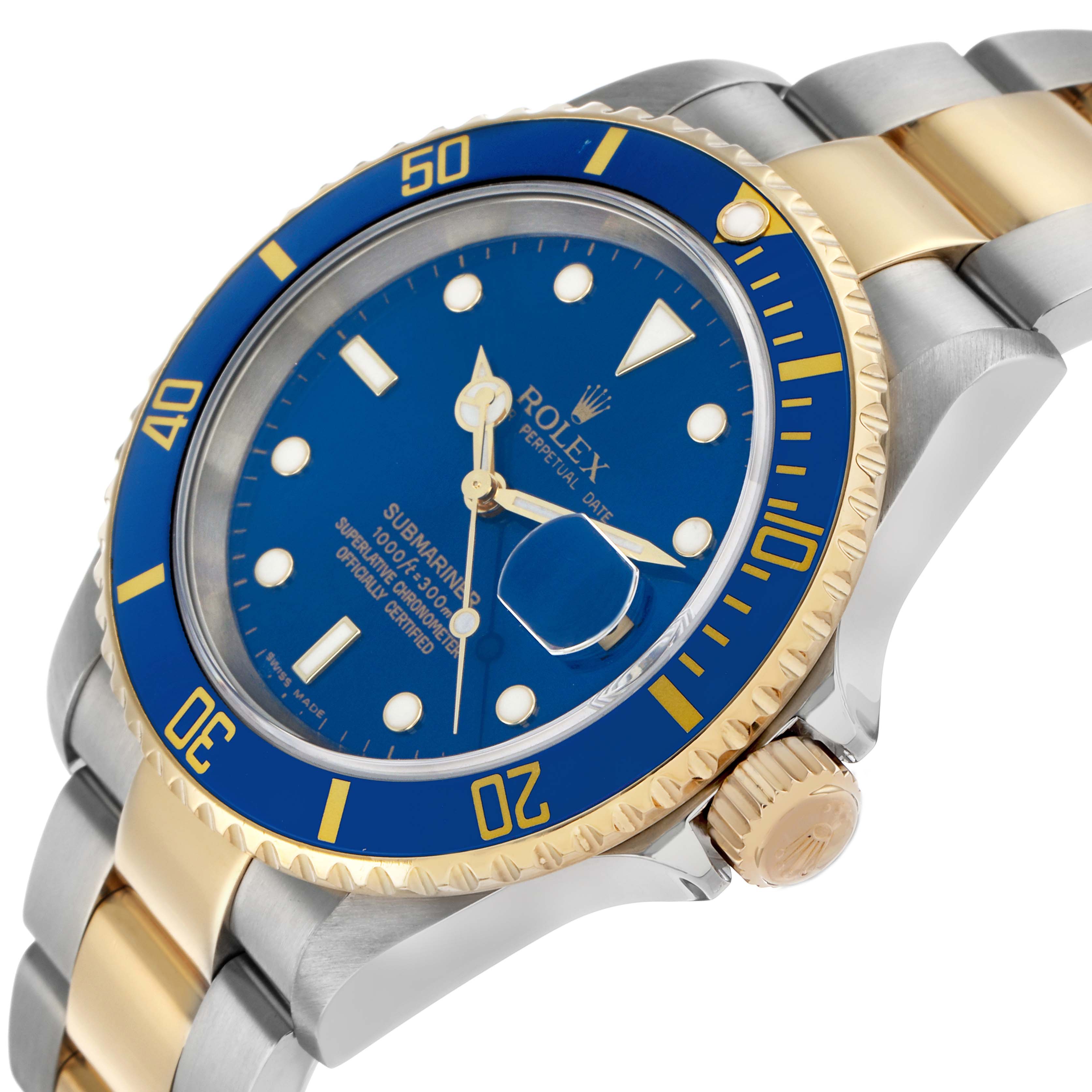 The Rolex Submariner 16613 Men's Steel and Gold (two tone) Blue Dial is angled to show the blue dial, gold bezel, and two-tone bracelet, emphasizing the crown and side profile.