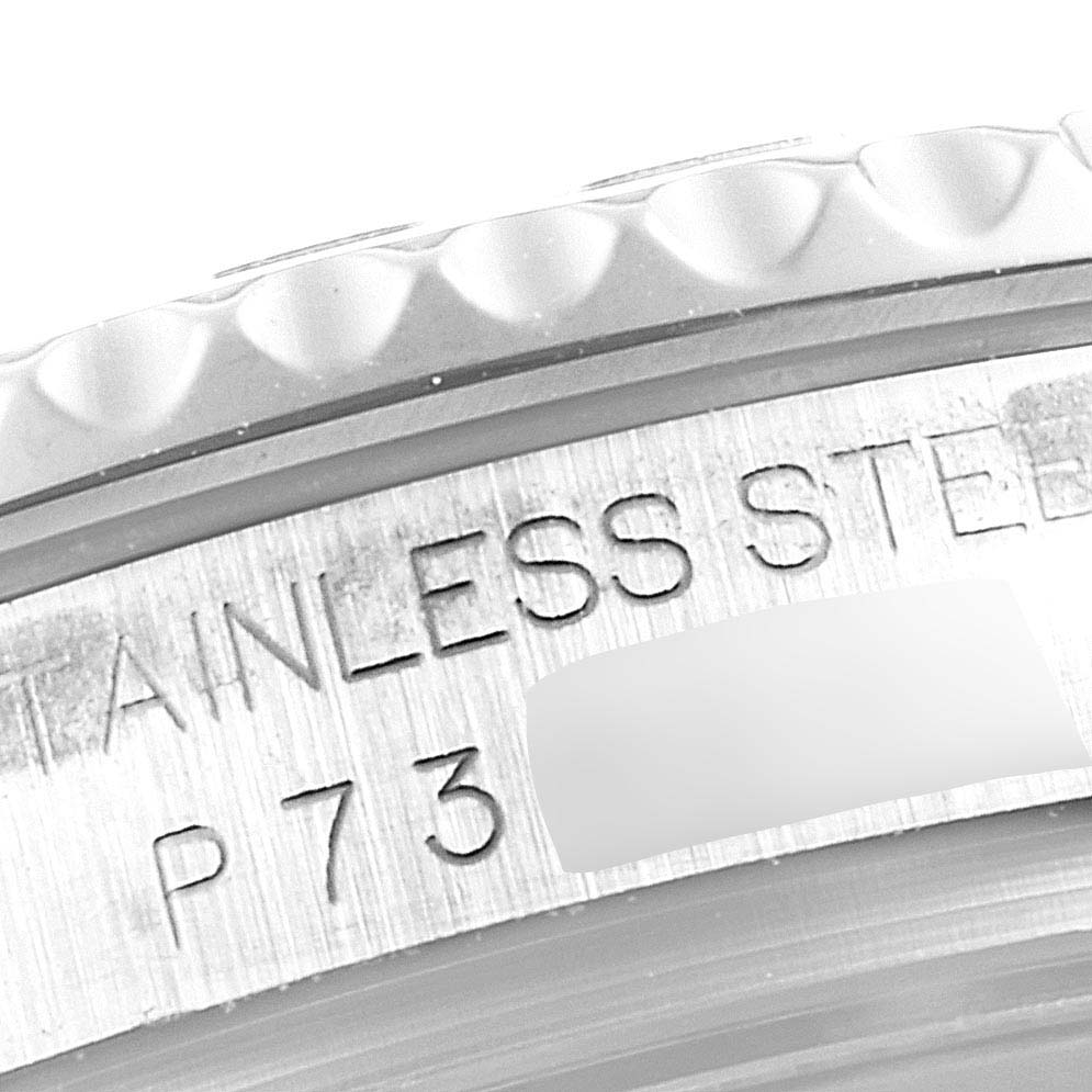 The image shows a close-up of the stainless steel bezel and engraving on the Rolex Yacht-Master 168622 Men
s Stainless Steel Silver Dial 168622 Men
s Stainless Steel Silver Dial watch.
