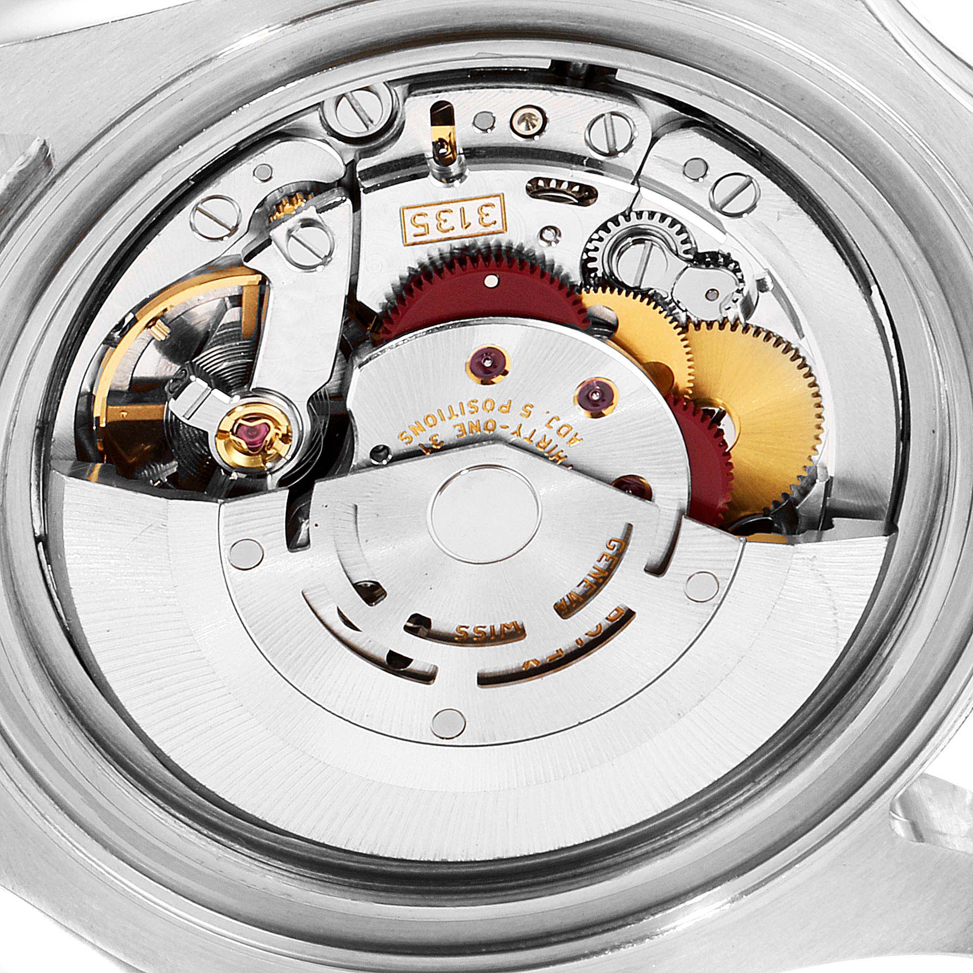 The image shows a close-up view of the Rolex Yacht-Master 16622 Men
s Stainless Steel Silver Dial 16622 Men
s Stainless Steel Silver Dial watch
s internal movement components from the back.