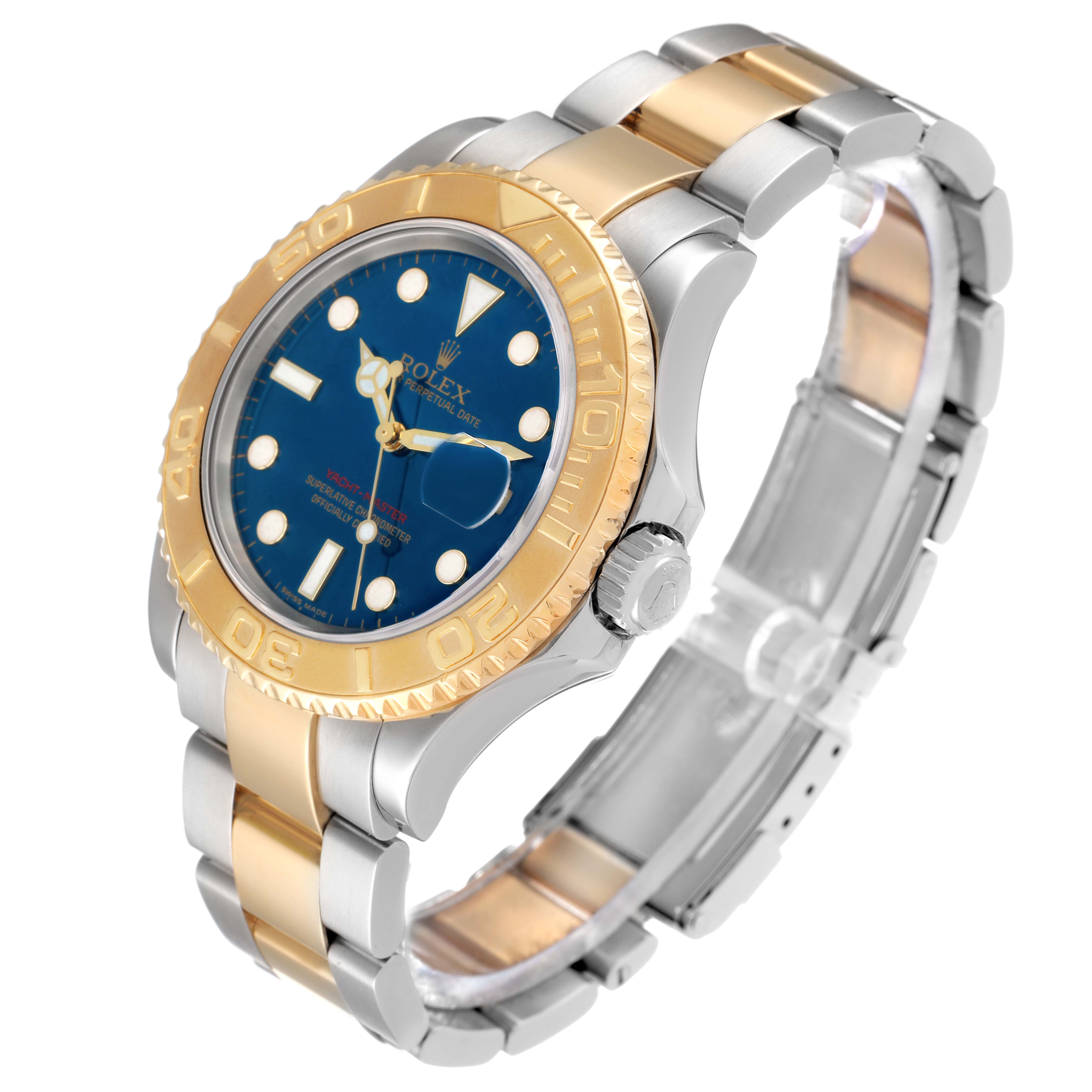 The Rolex Yacht-Master 16623 Men
s Steel and Gold (two tone) Blue Dial watch is shown at an angled side view, highlighting the bezel, dial, case, and bracelet.