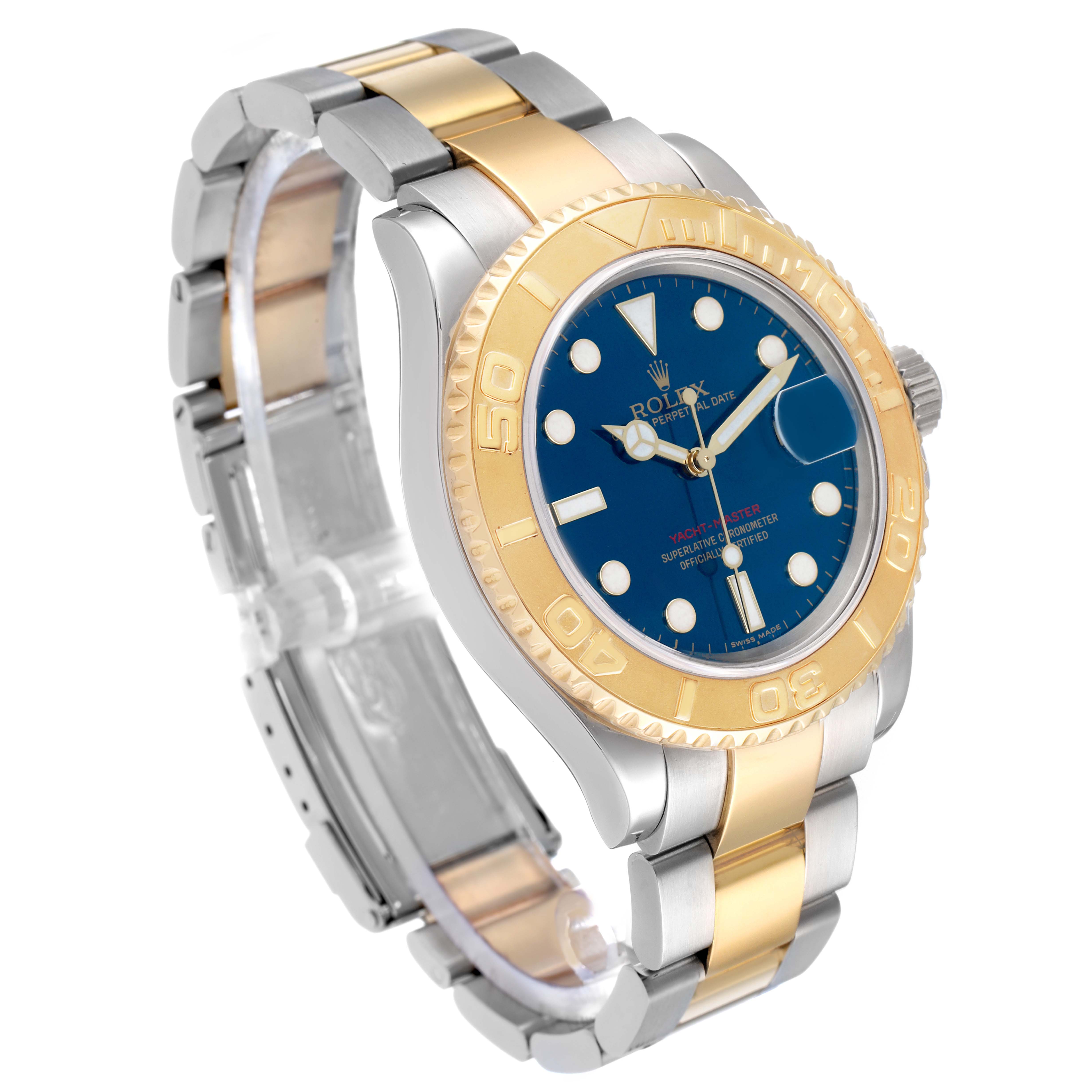 The Rolex Yacht-Master 16623 Men
s Steel and Gold (two tone) Blue Dial is shown at a three-quarter angle, displaying its gold bezel, blue dial, and two-tone bracelet.