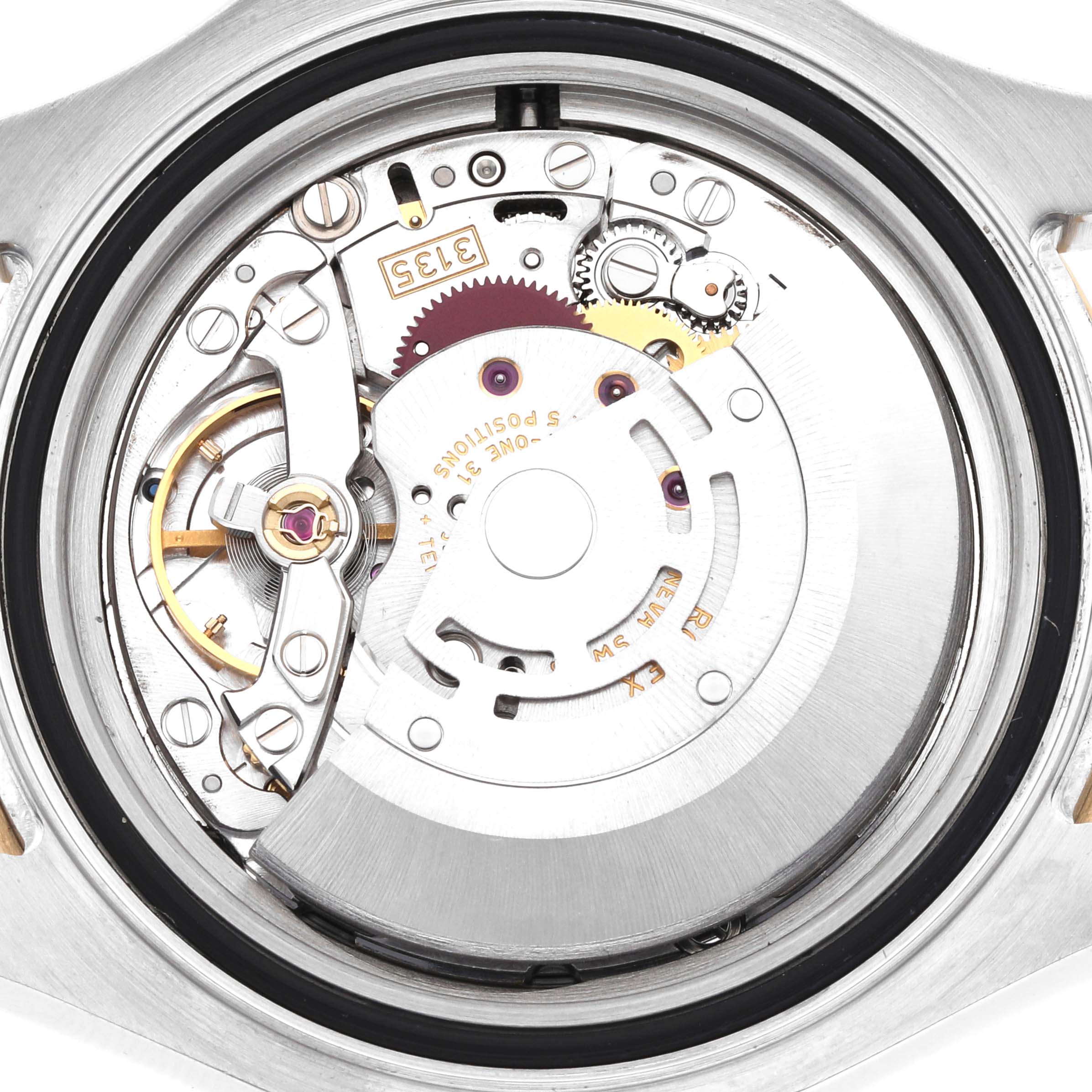 The image shows the back view of a Rolex Yacht-Master 16623 Men
s Steel and Gold (two tone) Blue Dial, highlighting its intricate movement mechanism.