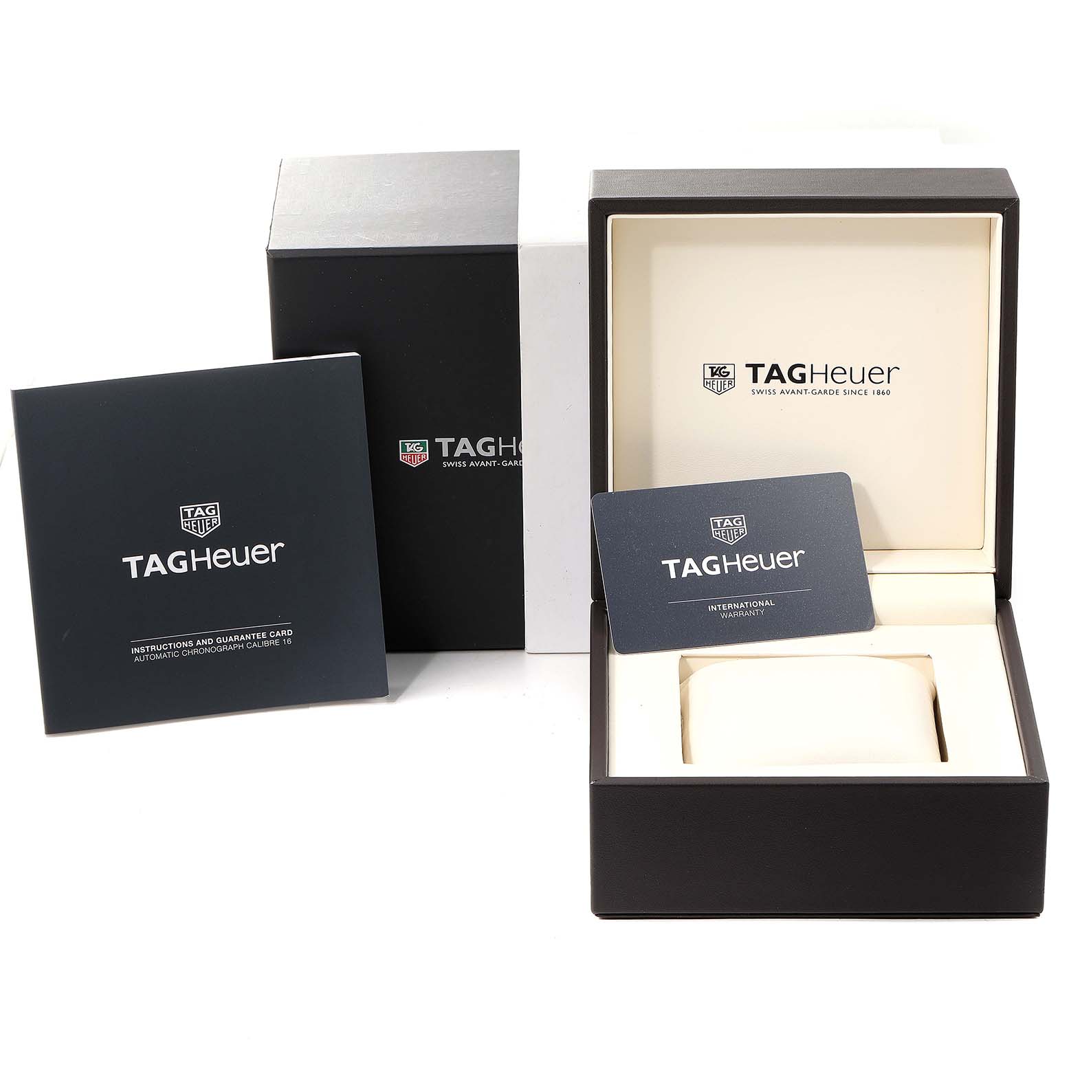 The image shows the official packaging and accessories for the Tag Heuer Aquaracer CAK2112.BA0833 Men
s Stainless Steel Blue Dial CAK2112.BA0833 Men
s Stainless Steel Blue Dial, including the box, warranty card, and instruction manual.