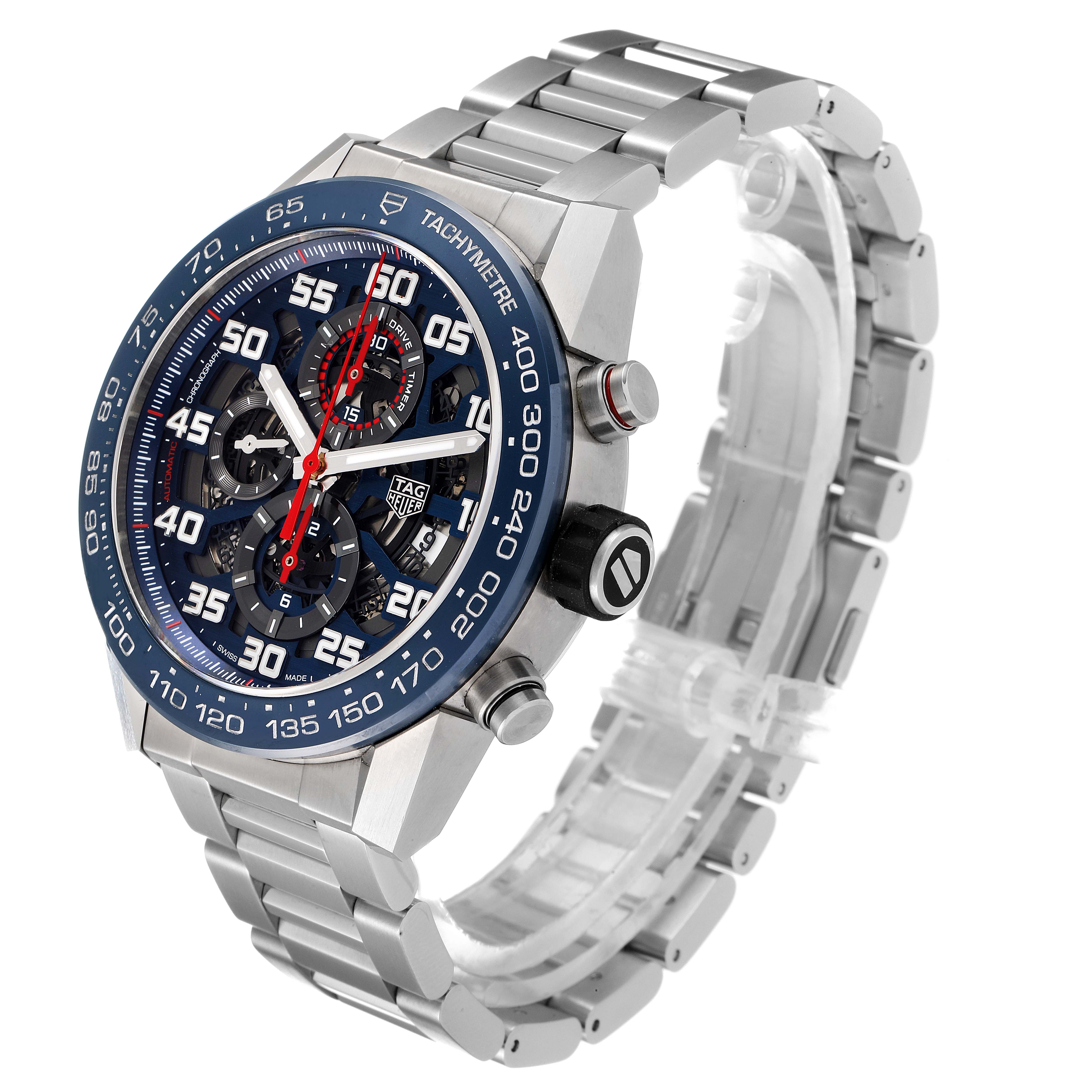 The image shows a Tag Heuer Carrera CAR2A1K.BA0703 Men
s Stainless Steel Blue Dial CAR2A1K.BA0703 Men
s Stainless Steel Blue Dial watch at an angled side view, displaying its face, bezel, crown, pushers, and metal bracelet.