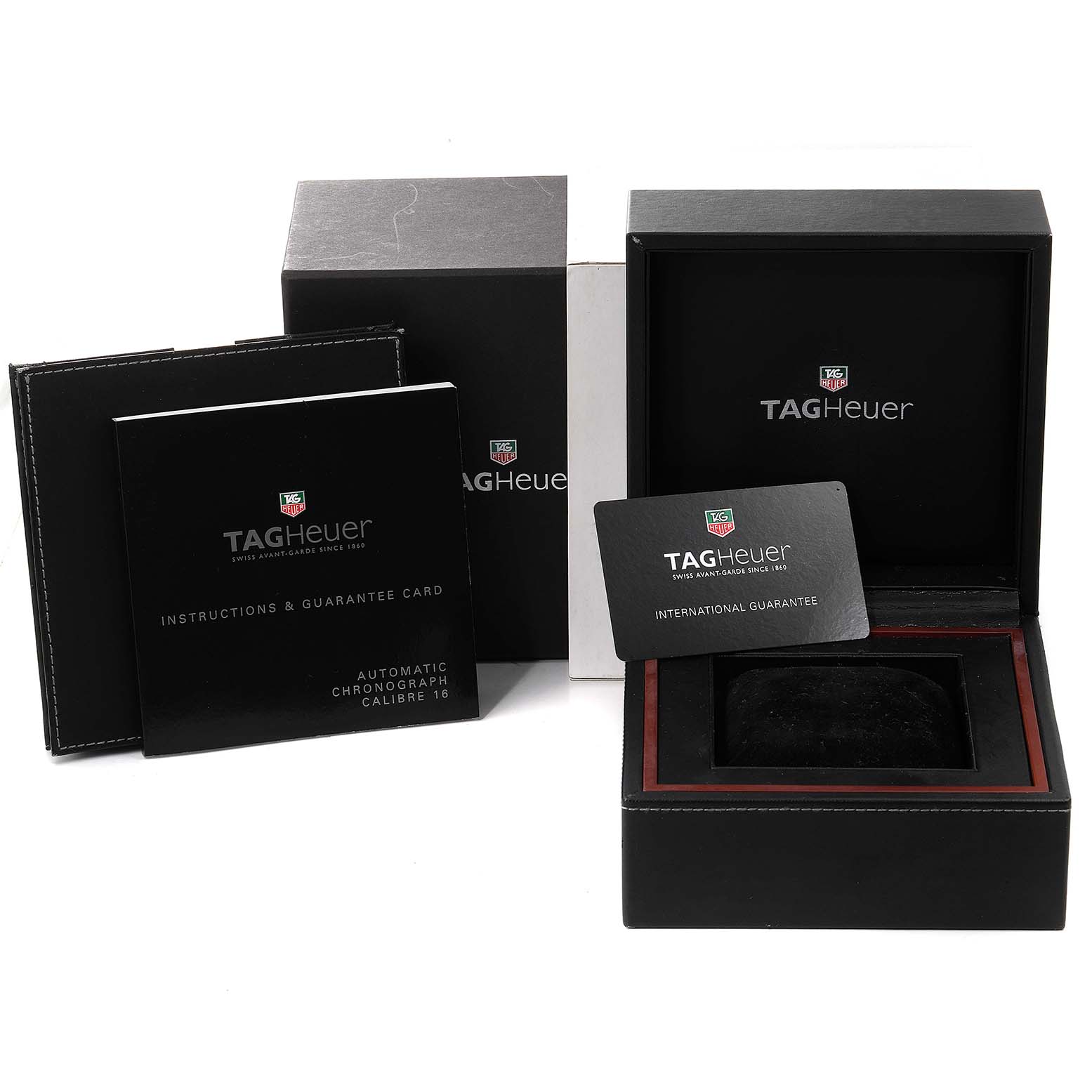 The image shows the packaging, instruction booklets, and guarantee cards for the Tag Heuer Link CJF2150.BB0595 Men's Steel and Gold (two tone) Silver Dial CJF2150.BB0595 Men's Steel and Gold (two tone) Silver Dial model watch.