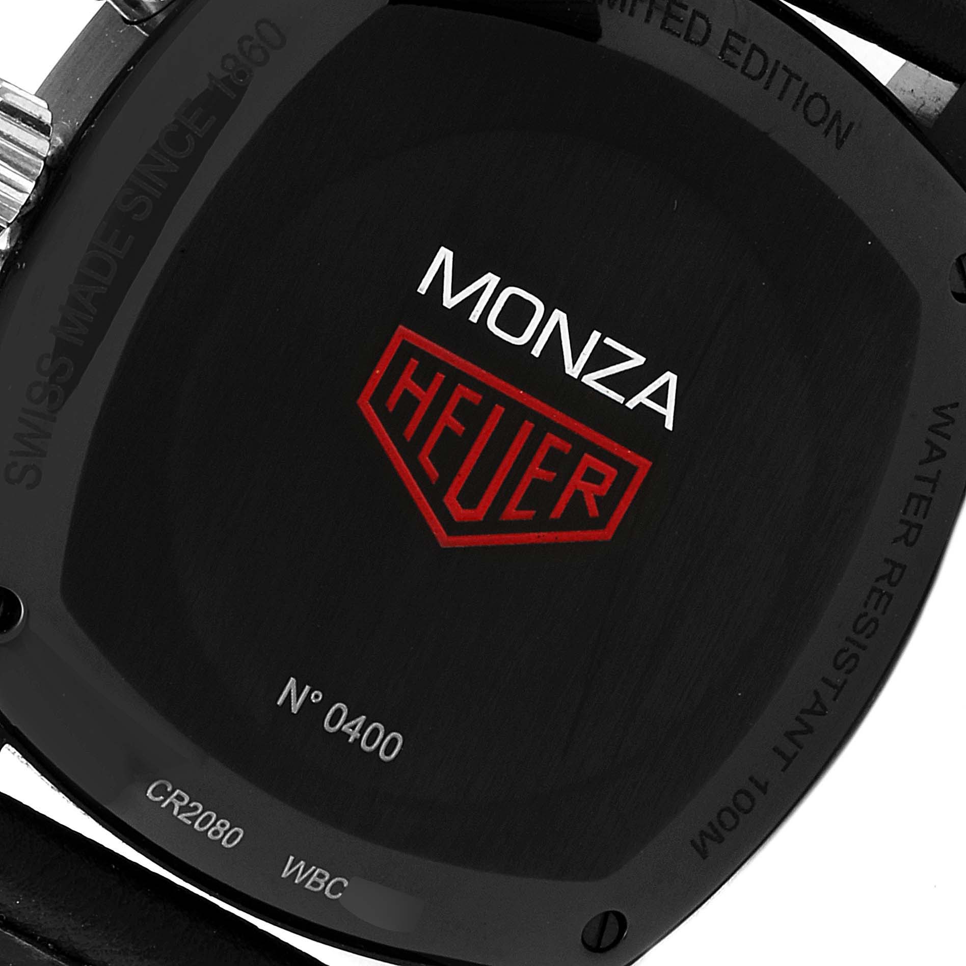 The image shows the back case of a Tag Heuer Monza watch, highlighting its branding and specifications.