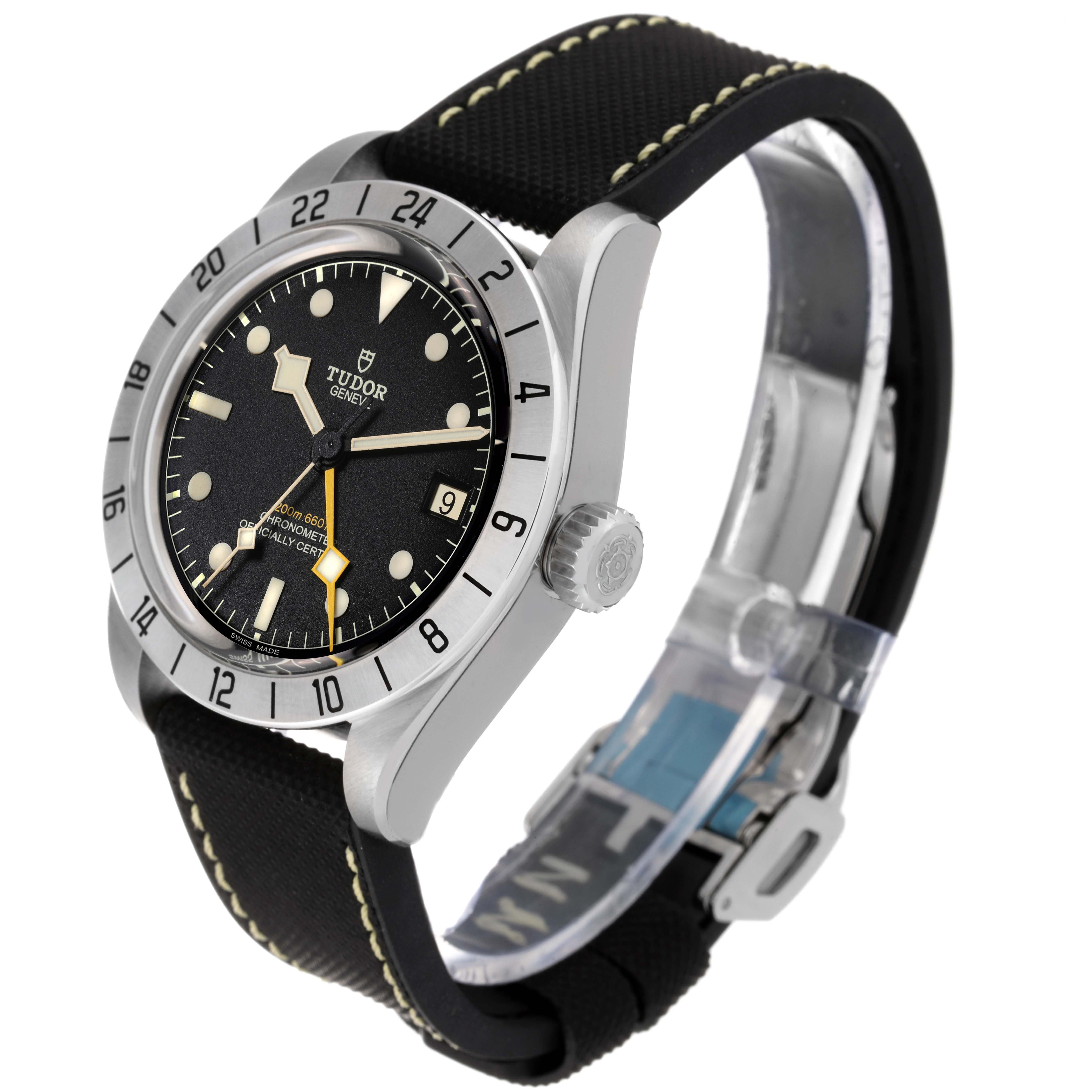 The image shows a Tudor Heritage Black Bay M79470-0003 Men
s Stainless Steel Black Dial M79470-0003 Men
s Stainless Steel Black Dial watch with a side angle, highlighting its face, crown, and strap.