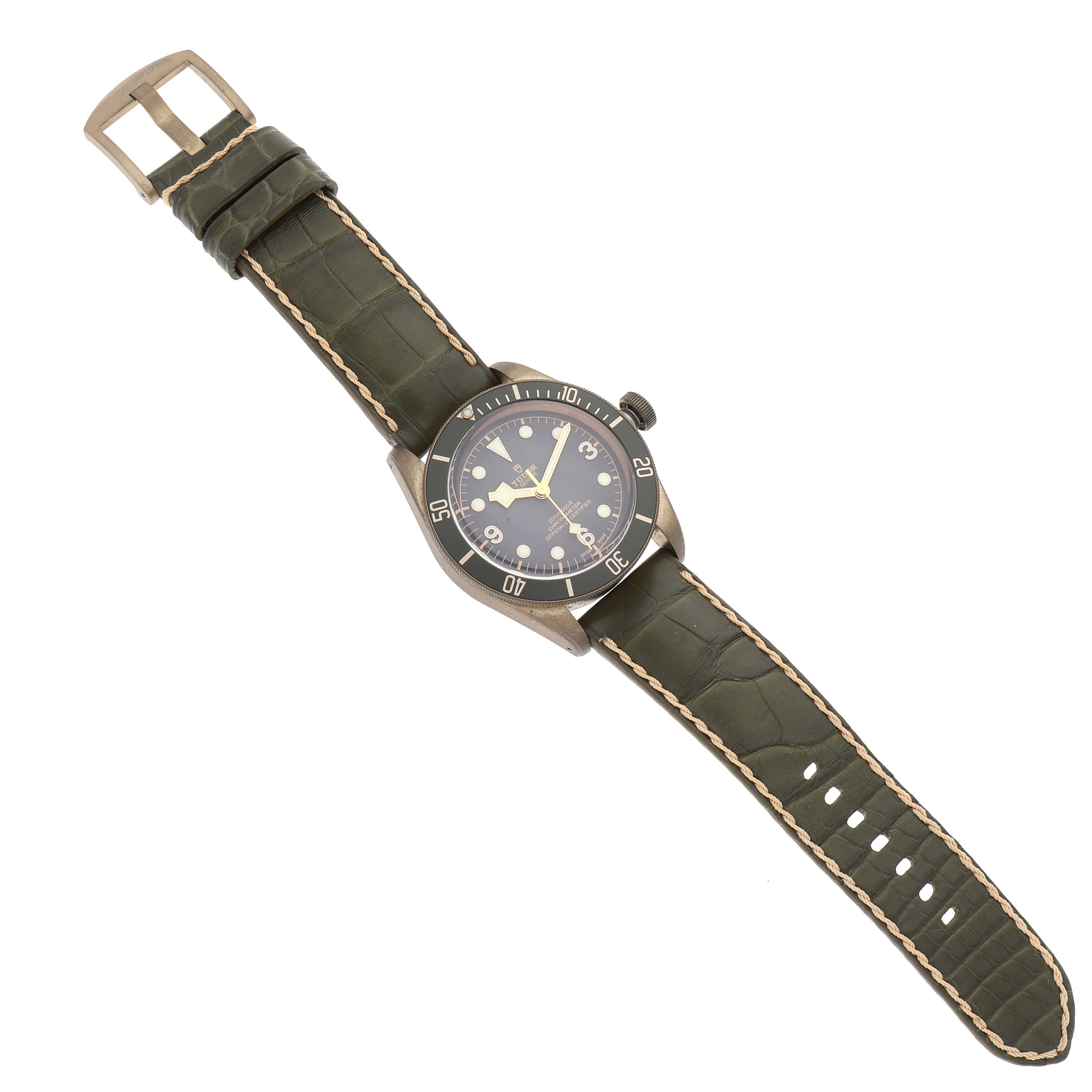 The image shows a Tudor Heritage Black Bay 79250BA Men's Bronze Black Dial 79250BA Men's Bronze Black Dial watch laid flat displaying the full face, strap, and buckle.