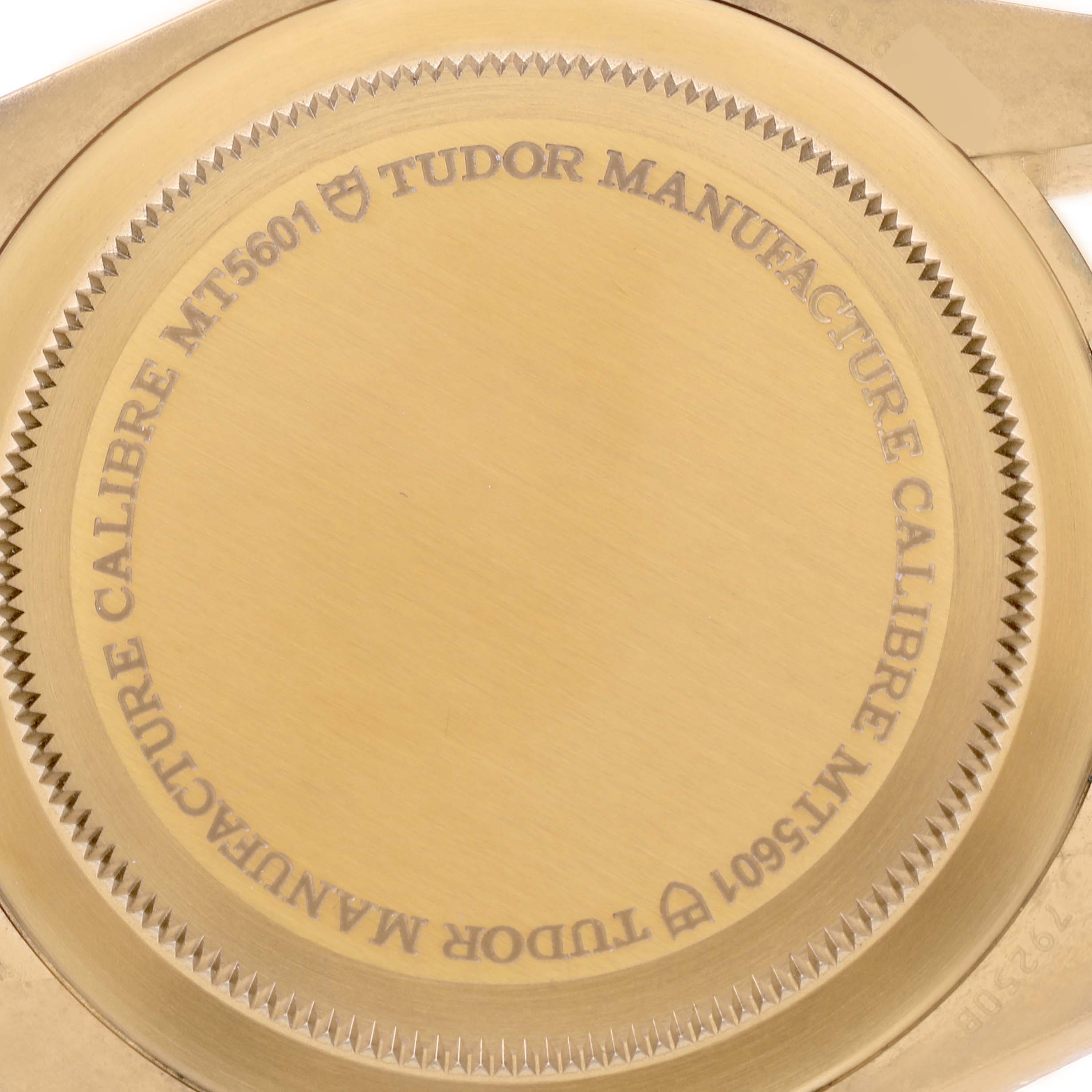 The image shows the backside of the Tudor Heritage Black Bay 79250BA Men's Bronze Black Dial 79250BA Men's Bronze Black Dial watch, highlighting the engraved case back.