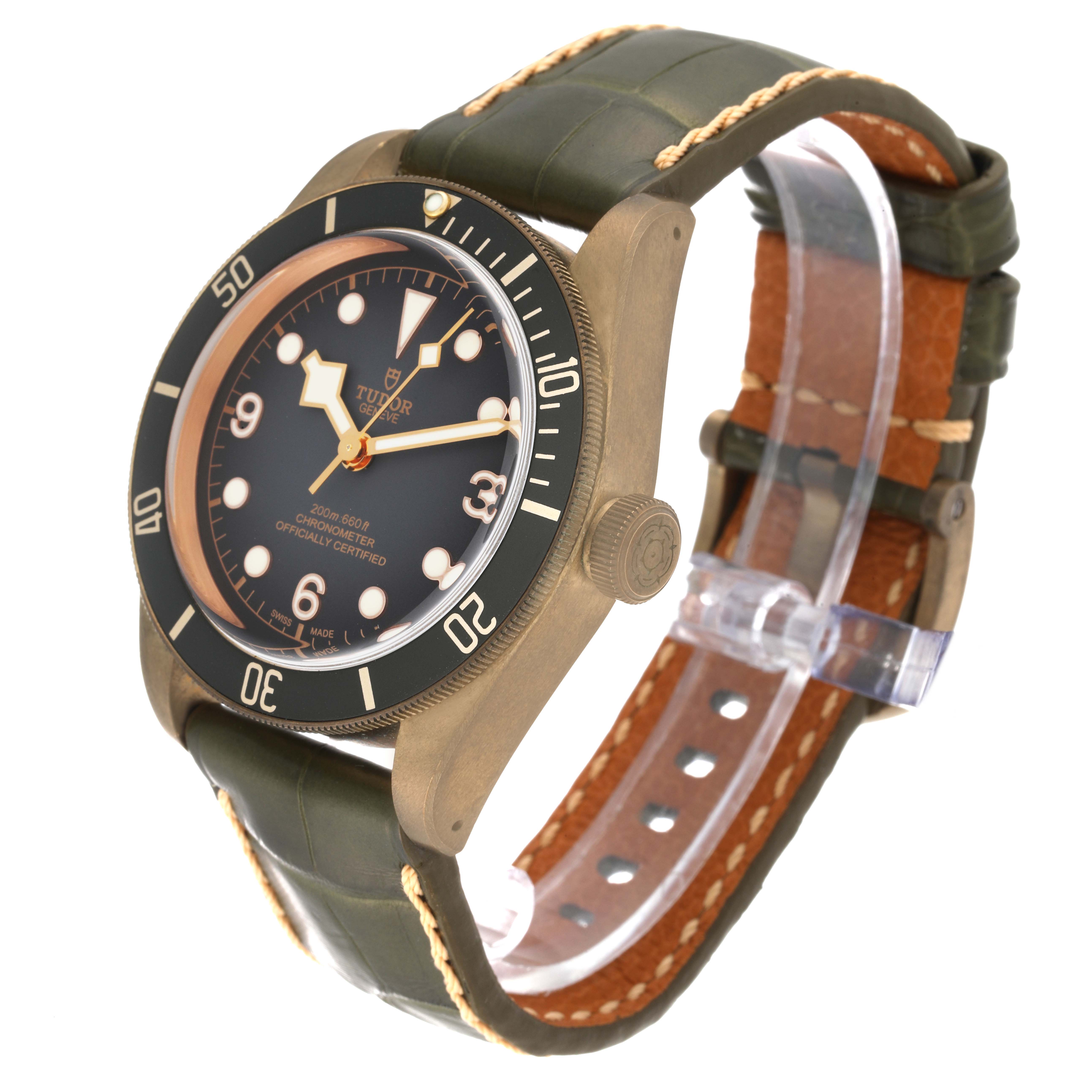 The Tudor Heritage Black Bay 79250BA Men's Bronze Black Dial 79250BA Men's Bronze Black Dial watch is shown from a front-side angle, highlighting the dial, bezel, and strap.