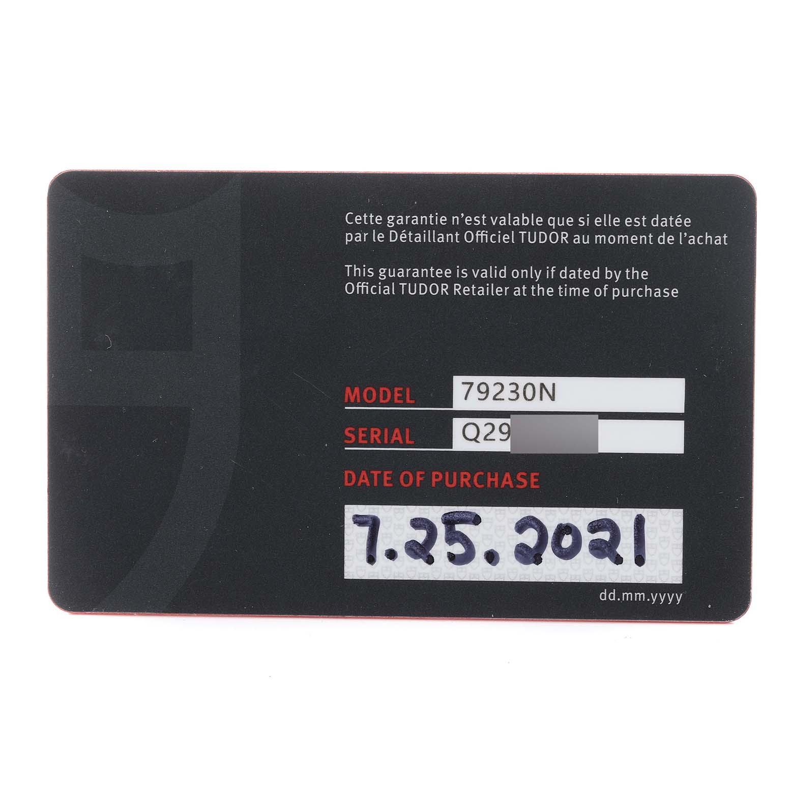 This image shows a guarantee card for the Tudor Heritage Black Bay 79230 Men
s Stainless Steel Black Dial 79230 Men
s Stainless Steel Black Dial model 79230N, including the serial number and date of purchase.