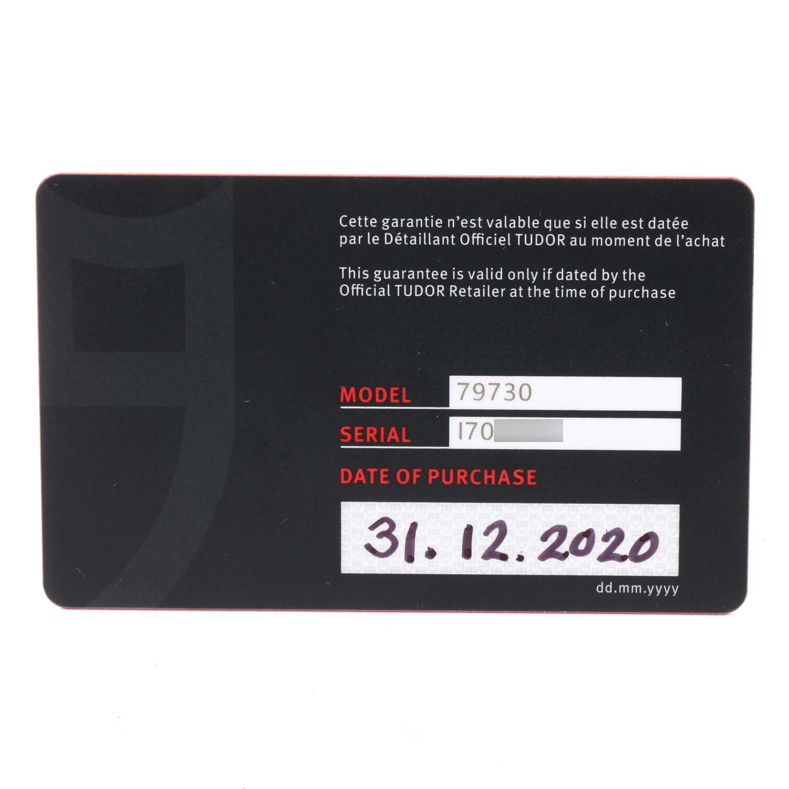 This is a warranty card for the Tudor Heritage Black Bay 55020 Men's Stainless Steel Black Dial 55020 Men's Stainless Steel Black Dial model 79730, showing the serial number and date of purchase.