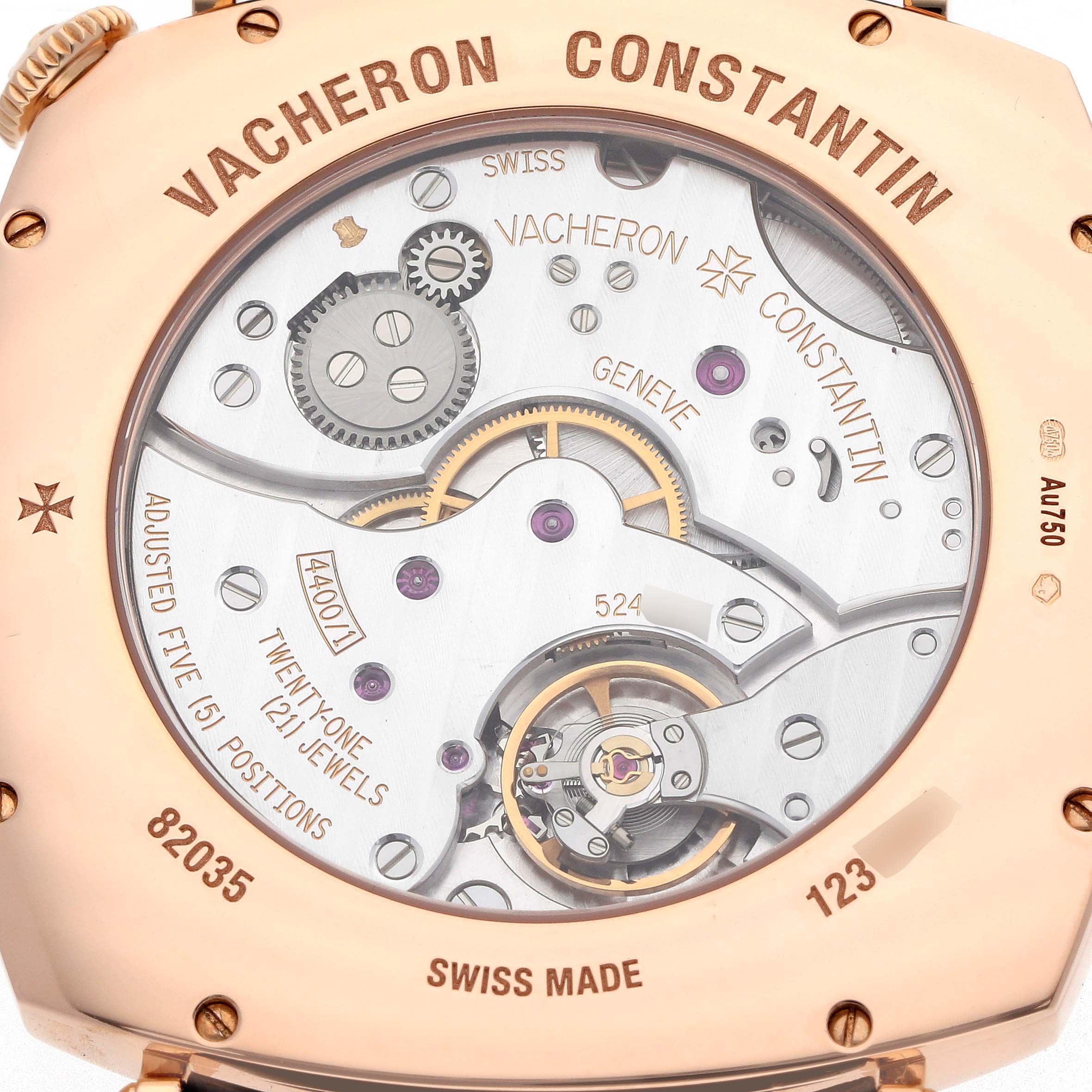 The image shows the back view of a Vacheron Constantin Historiques 82035/000R-9359 Men's Rose Gold Silver Dial model, highlighting its intricate movement and gears.