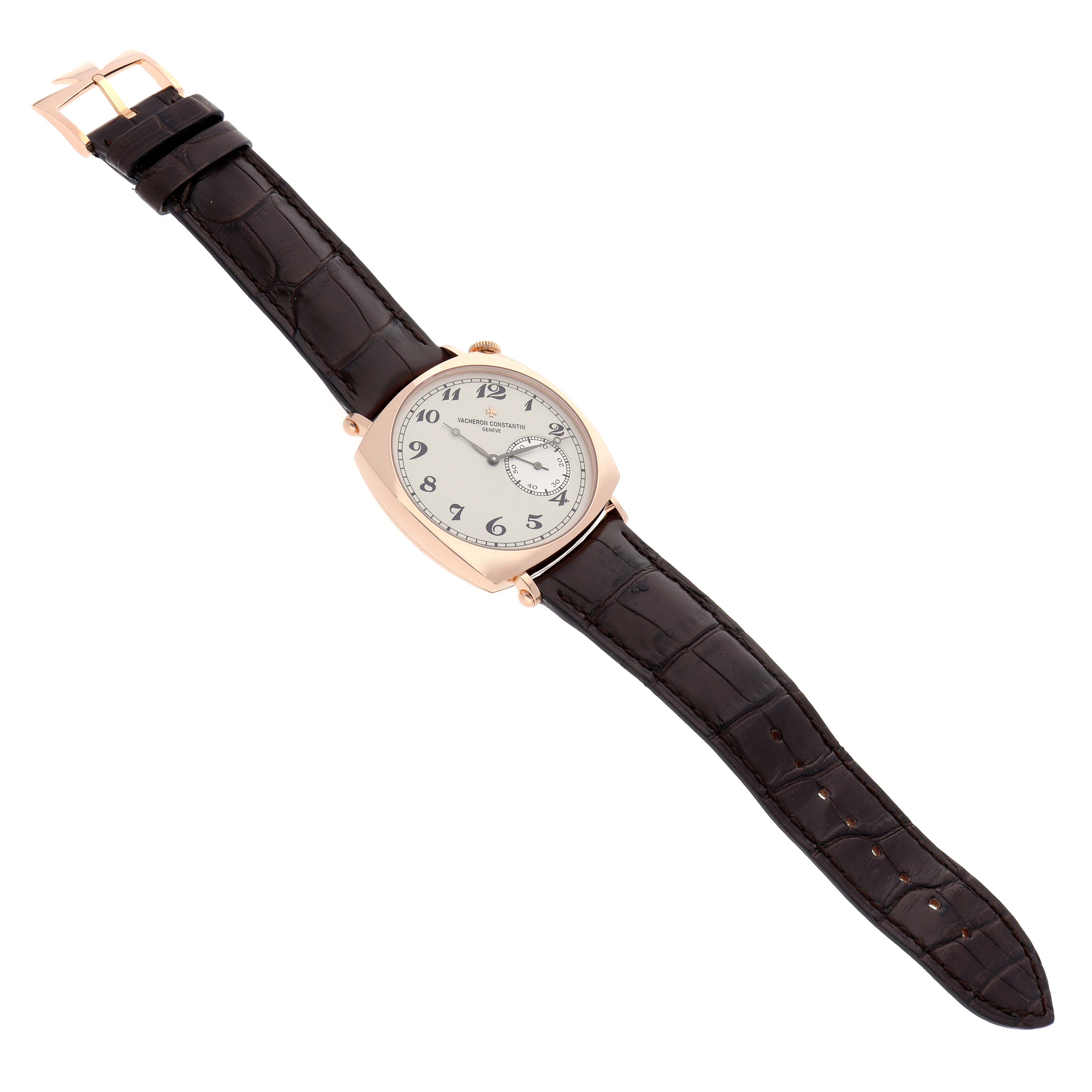 The Vacheron Constantin Historiques 82035/000R-9359 Men's Rose Gold Silver Dial watch is shown at an angle displaying its face, case, and brown leather strap.