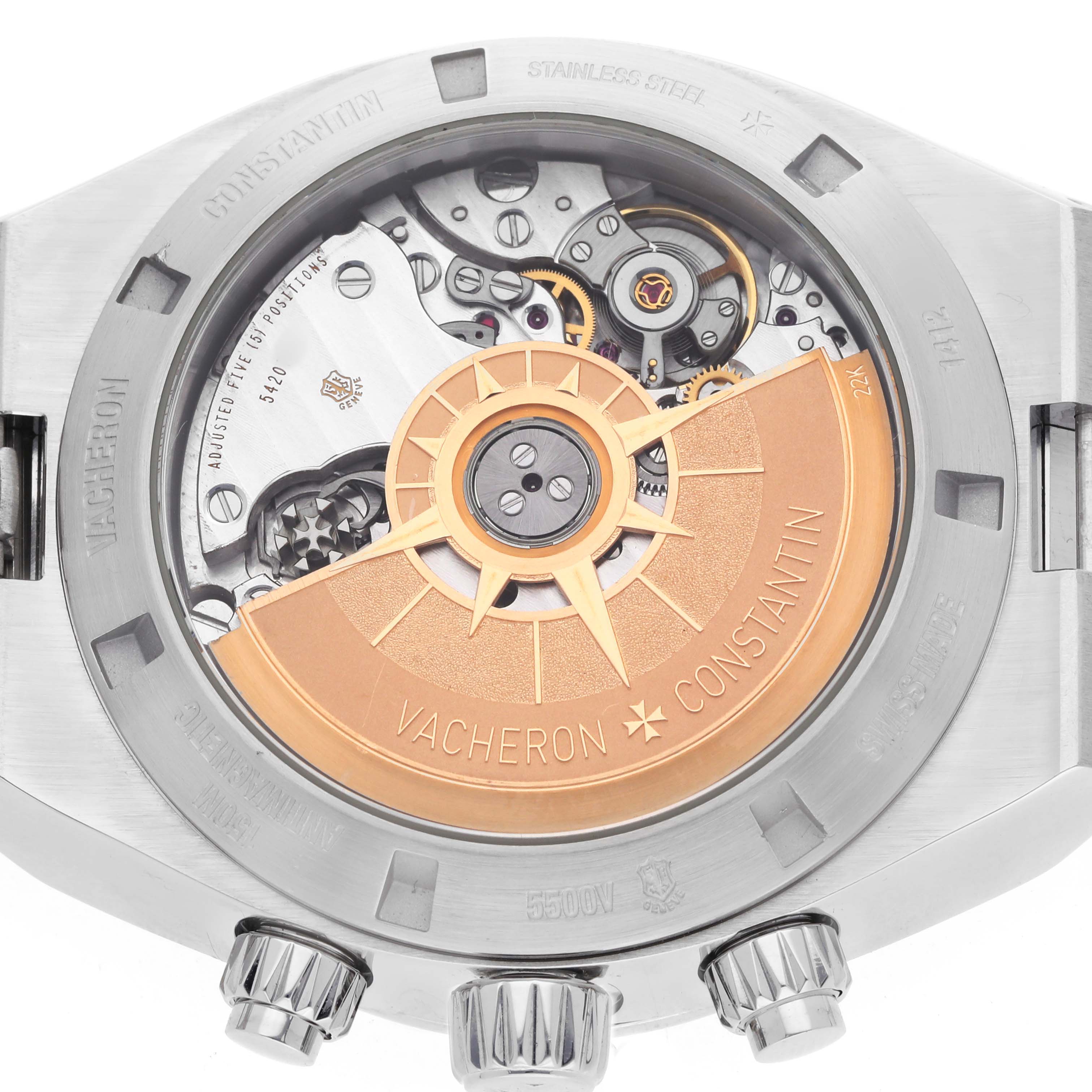 The image shows the back view of a Vacheron Constantin Overseas 5500V Men's Stainless Steel Blue Dial model, highlighting its open case back and movement.