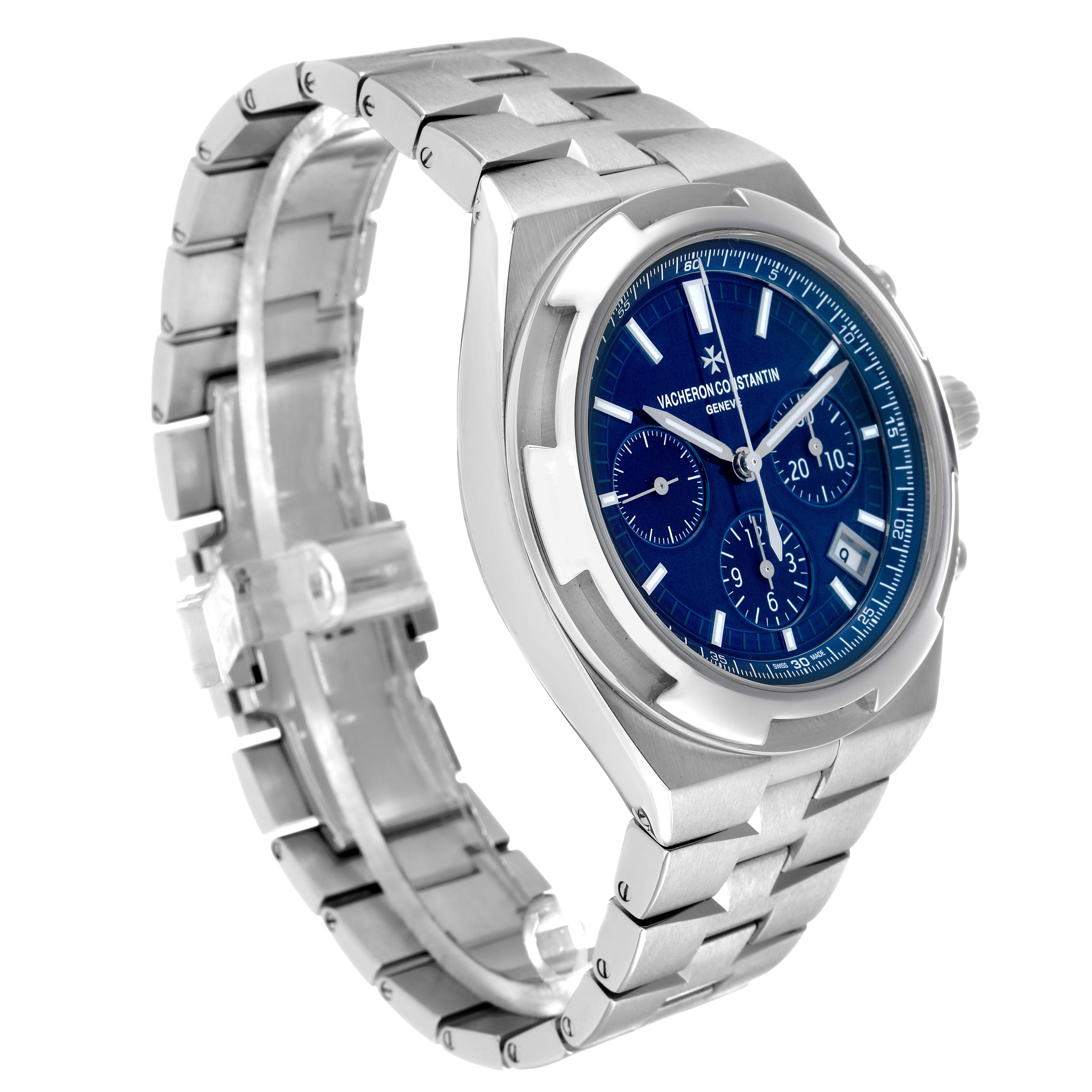 The Vacheron Constantin Overseas 5500V Men's Stainless Steel Blue Dial watch is shown at a three-quarter angle, highlighting its blue dial, chronograph subdials, and metal bracelet.