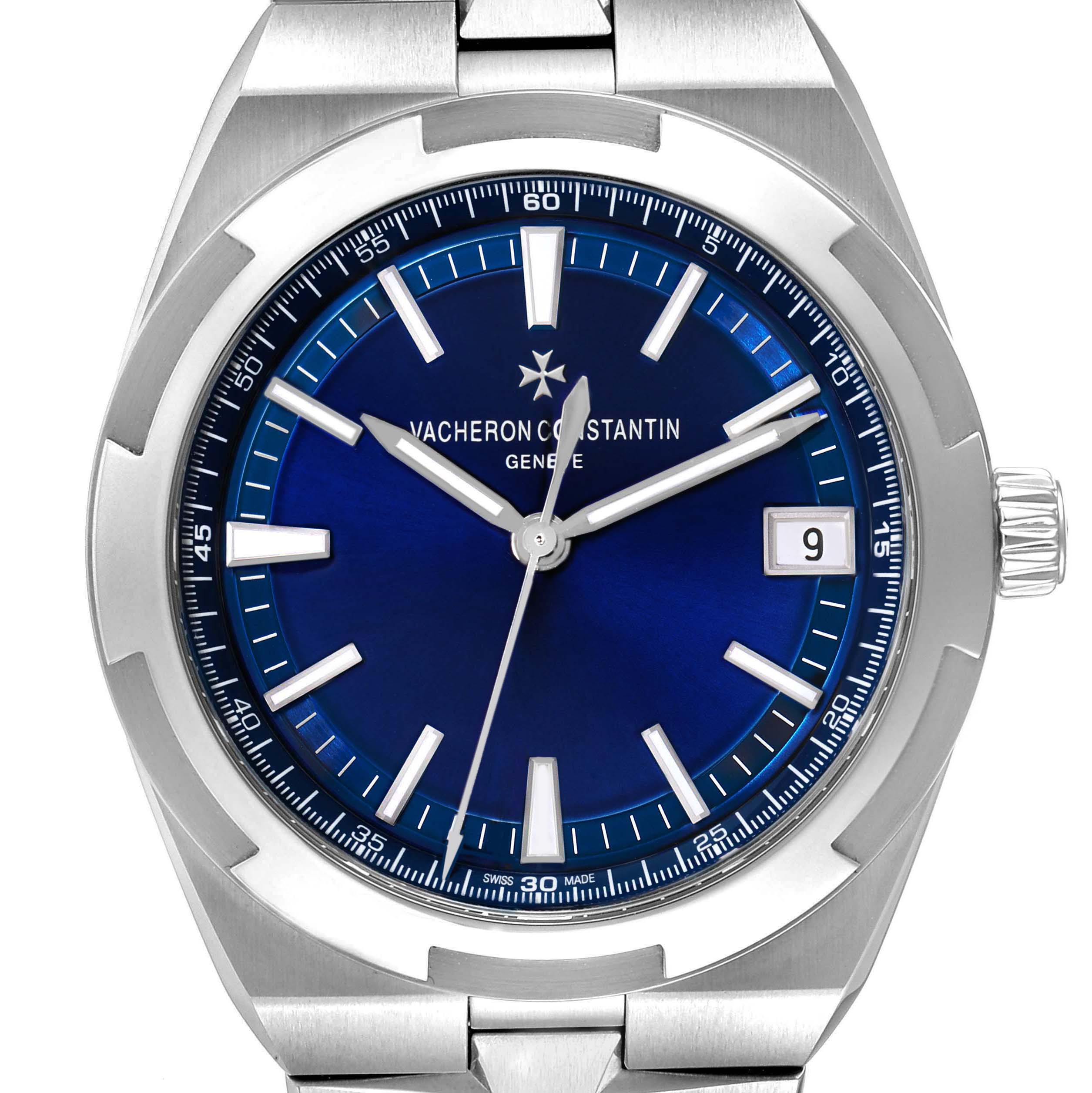 The image shows a frontal view of a Vacheron Constantin Overseas 4500V Men's Stainless Steel Blue Dial watch, highlighting its blue dial, silver hands, and date window.