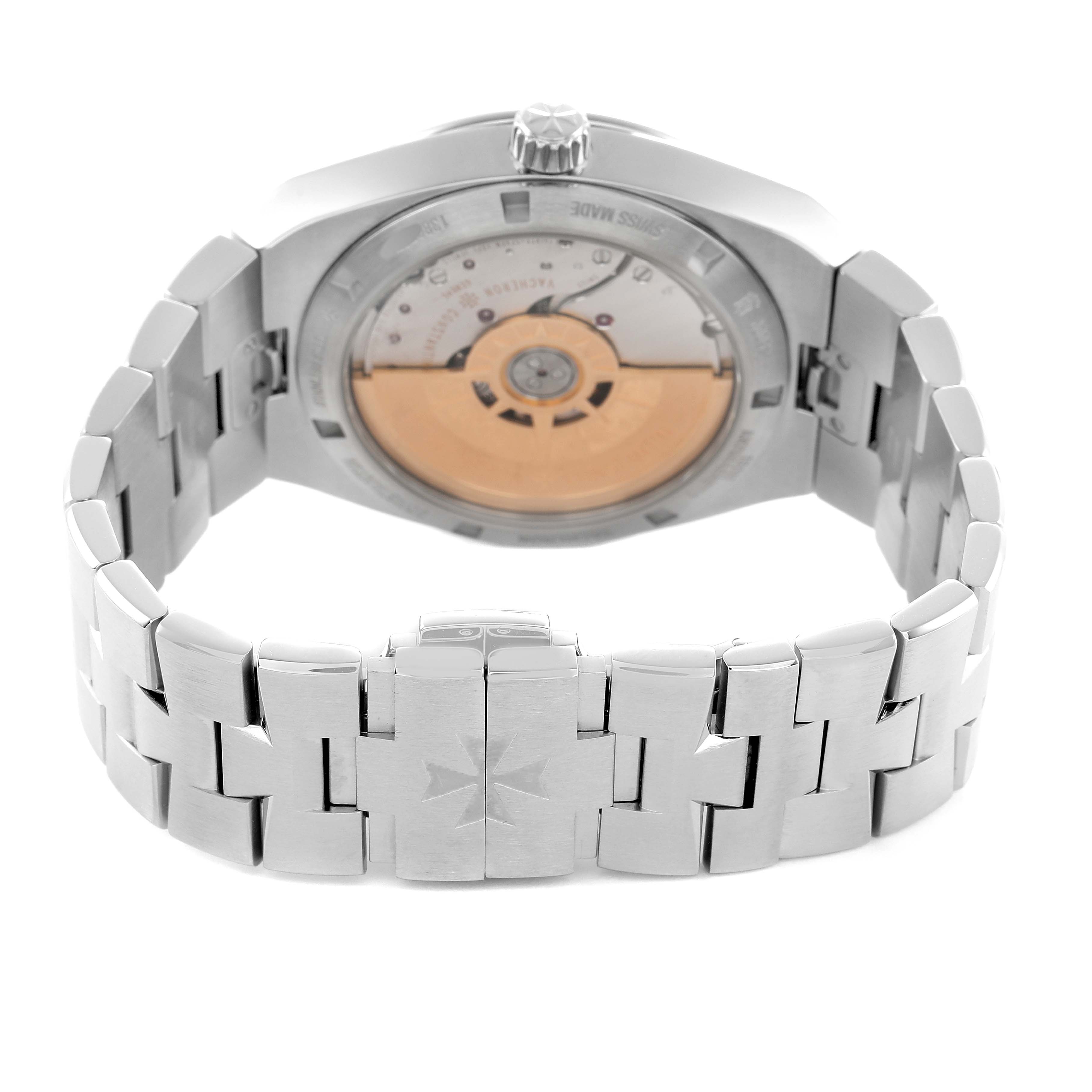 The Vacheron Constantin Overseas 4500V Men's Stainless Steel Blue Dial watch is shown from the back, highlighting the case back, crown, and bracelet.