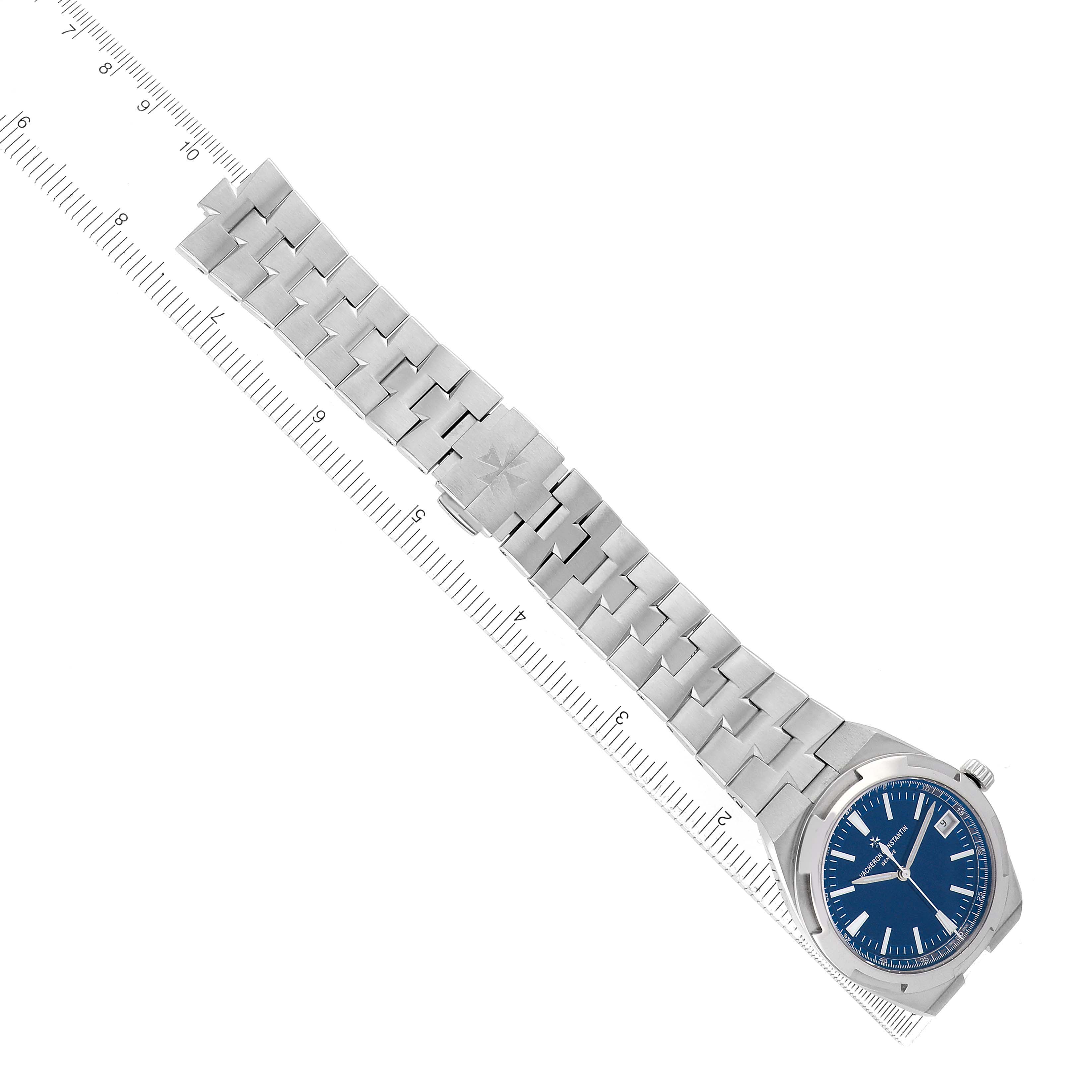 The image shows a Vacheron Constantin Overseas 4500V Men's Stainless Steel Blue Dial watch from a top-down angle, highlighting the bracelet, clasp, and face.