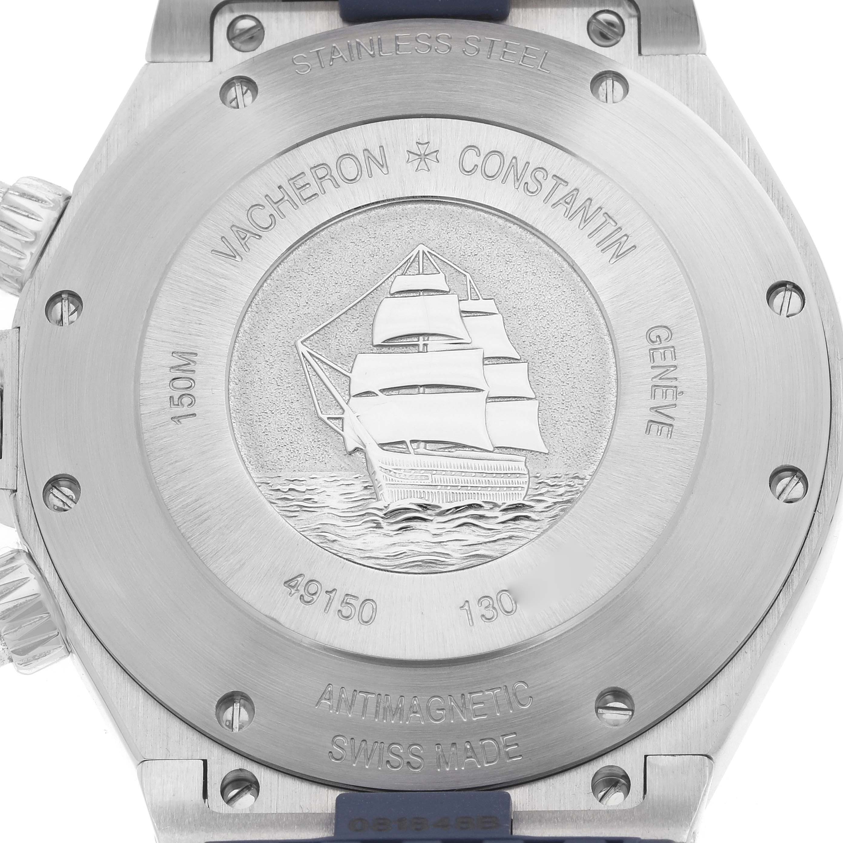The image shows the case back of a Vacheron Constantin Overseas 49150 Men's Stainless Steel Blue Dial watch, featuring an engraving of a ship and various inscriptions.
