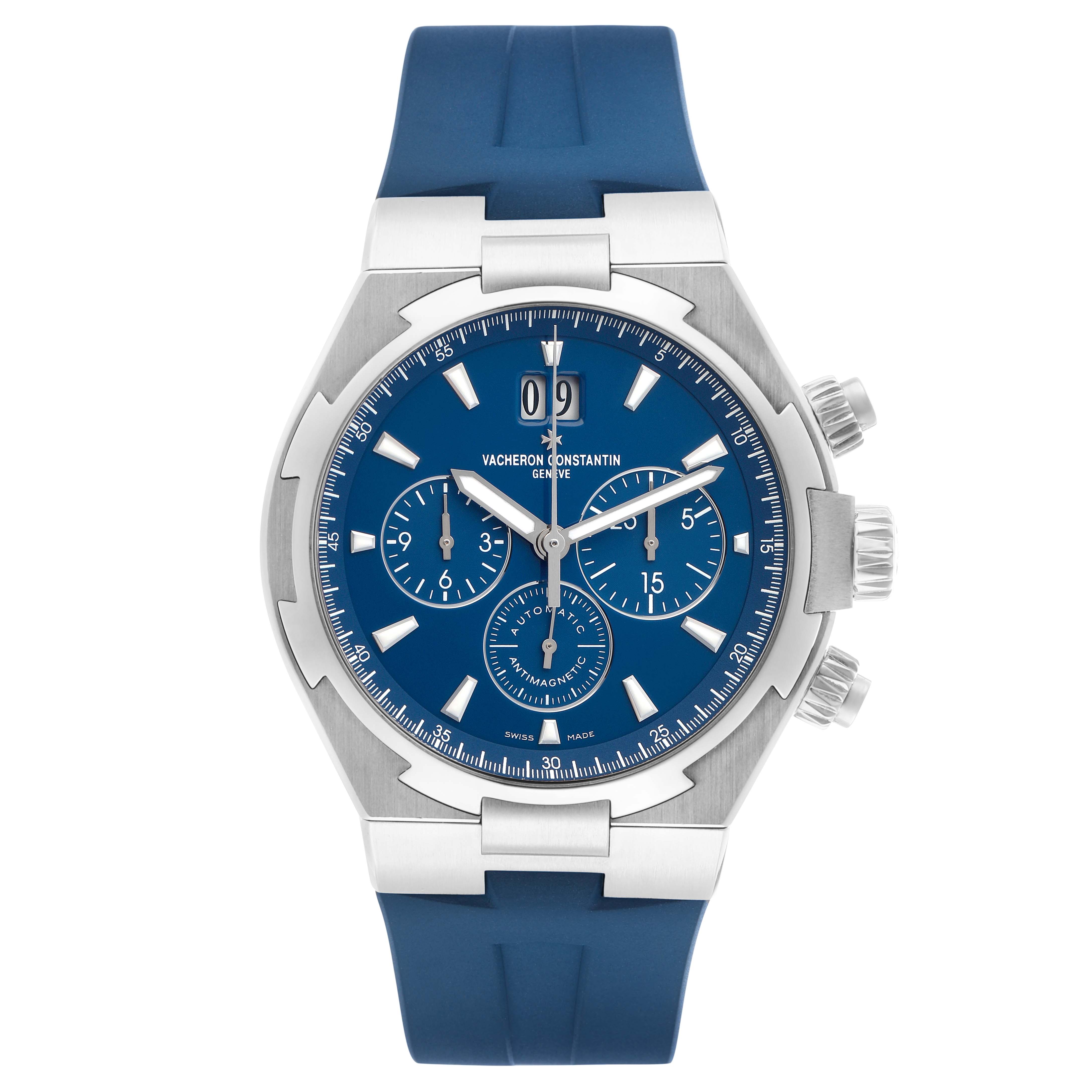 The Vacheron Constantin Overseas 49150 Men's Stainless Steel Blue Dial watch is shown from the front, highlighting its blue dial, subdials, and rubber strap.