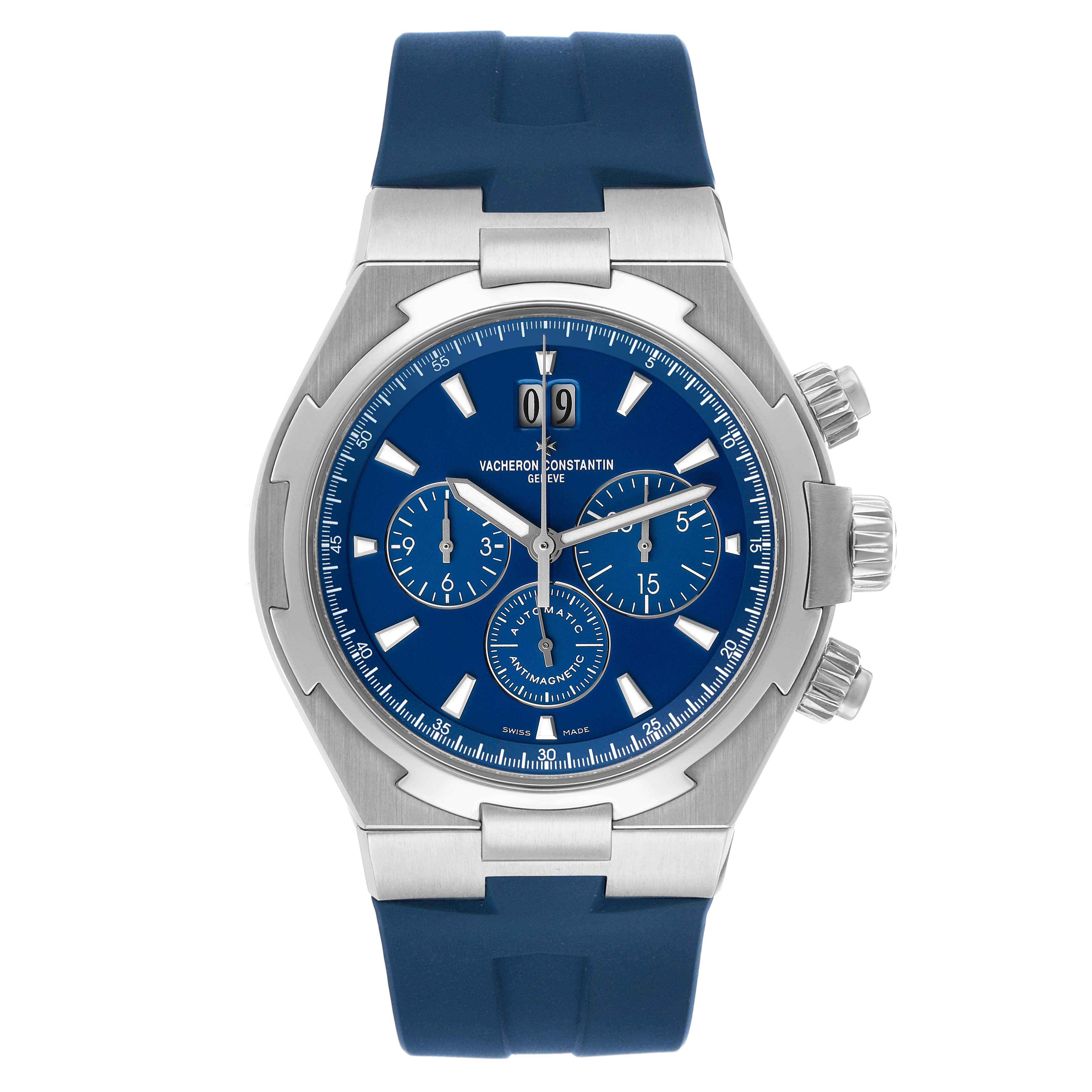 The Vacheron Constantin Overseas 49150 Men's Stainless Steel Blue Dial watch is shown from a front angle, highlighting its blue dial, subdials, and rubber strap.