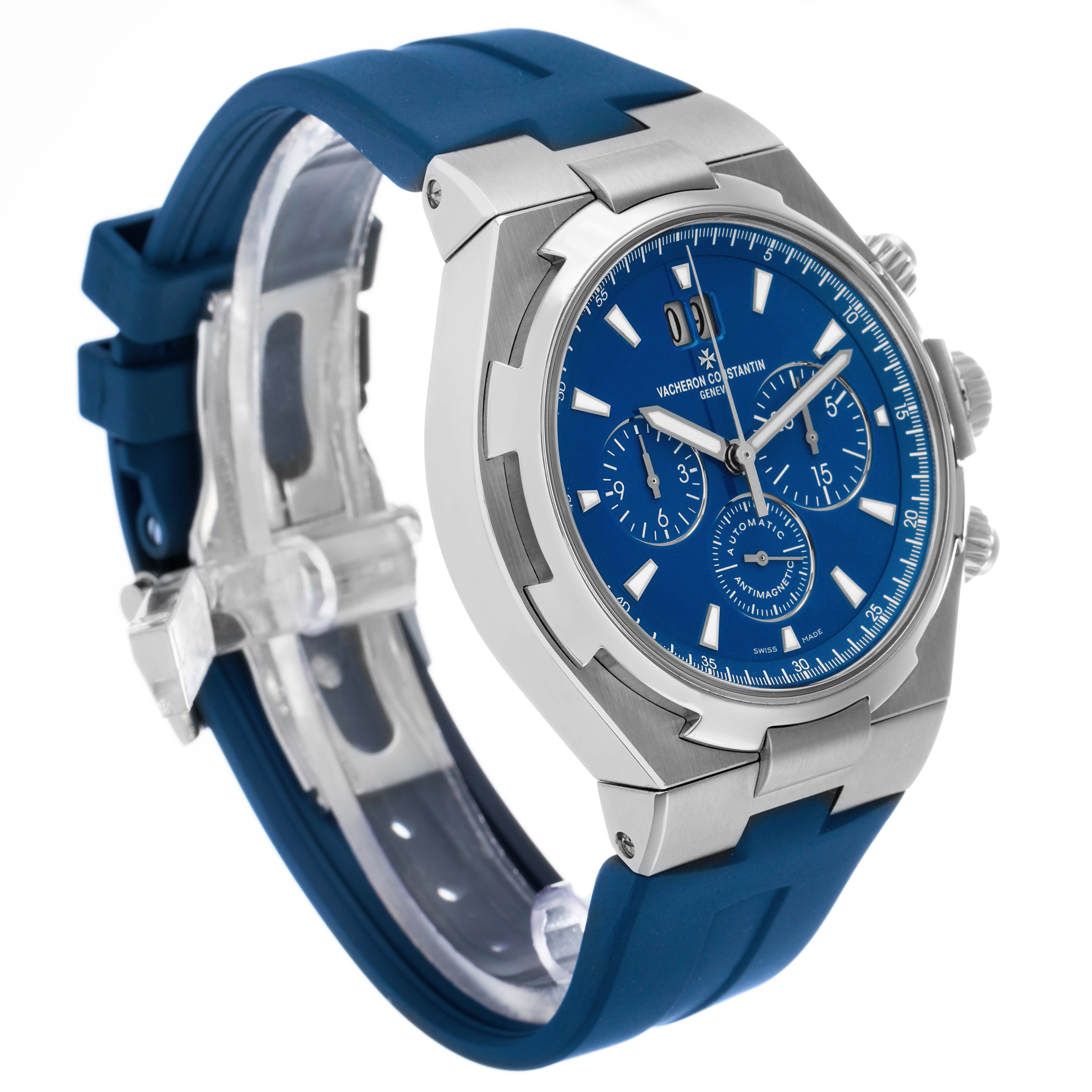The Vacheron Constantin Overseas 49150 Men's Stainless Steel Blue Dial watch is shown at a front-side angle, displaying the blue dial, case, and blue strap.