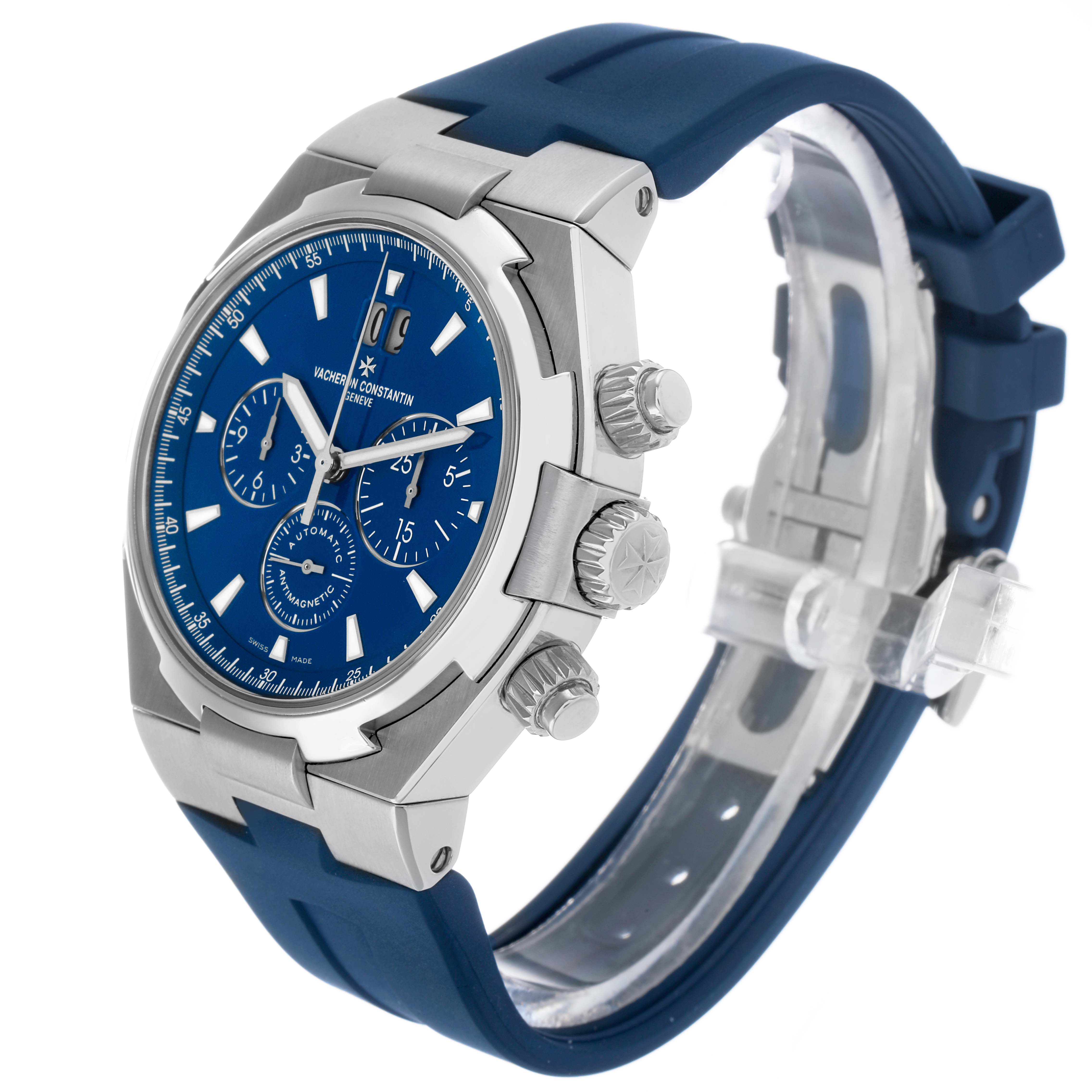 The Vacheron Constantin Overseas 49150 Men's Stainless Steel Blue Dial watch is shown at a three-quarter angle, featuring the case, dial, crown, and blue strap.