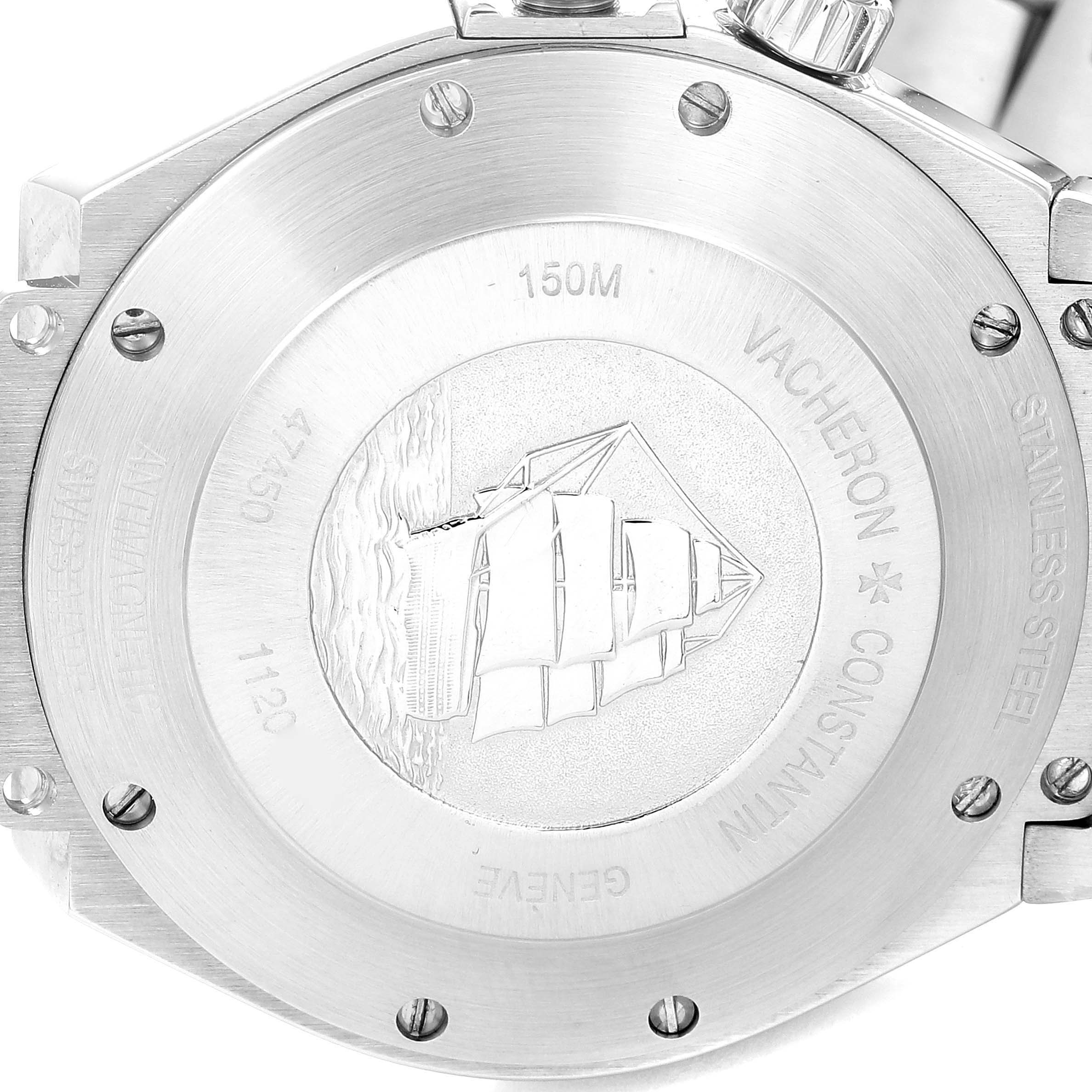 The image shows the back case of the Overseas model by Vacheron Constantin, displaying its stainless steel finish and engravings.