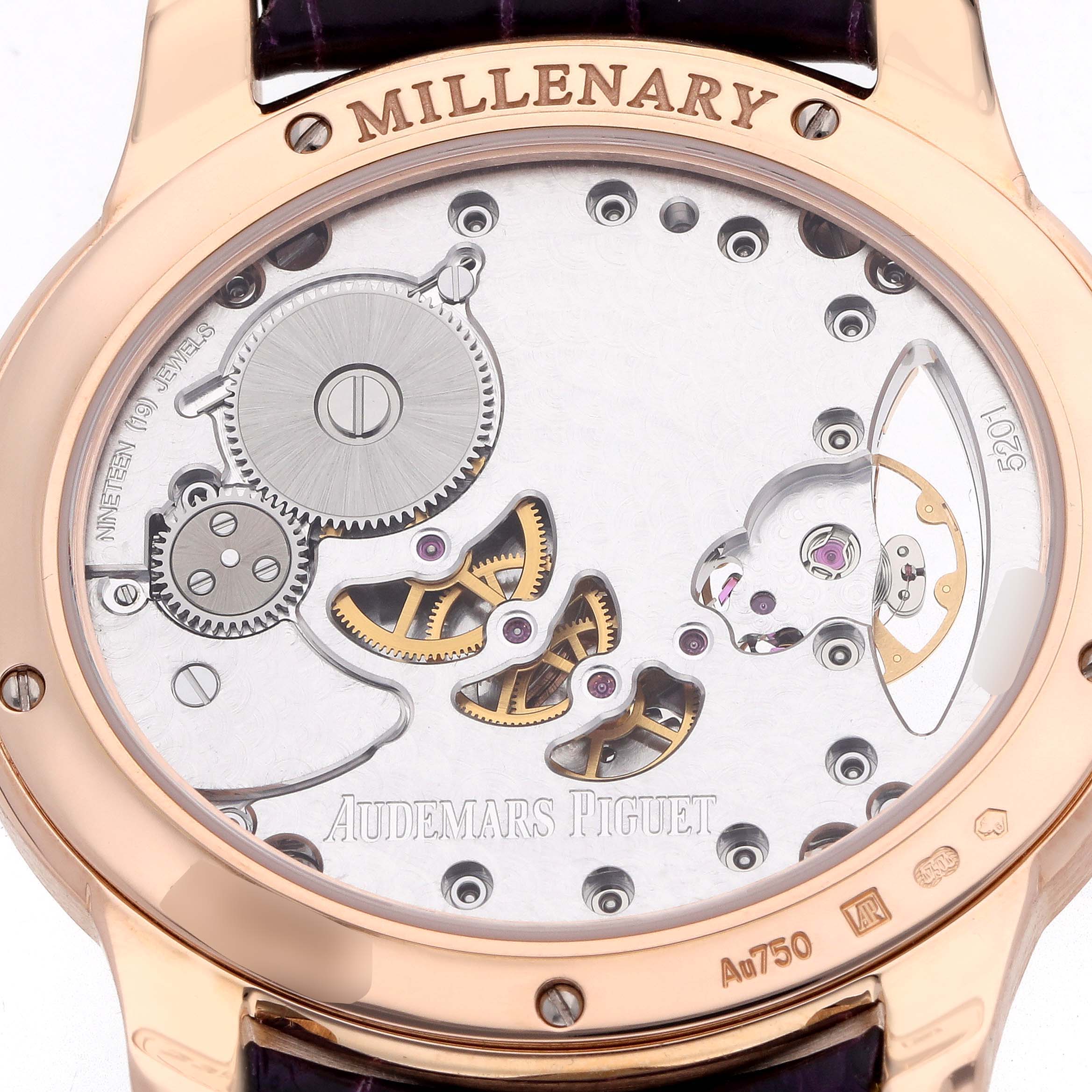 This image shows the back case of the Audemars Piguet Millenary 77247OR Women's Rose Gold Mother of Pearl Dial watch, highlighting its internal mechanics and branding.