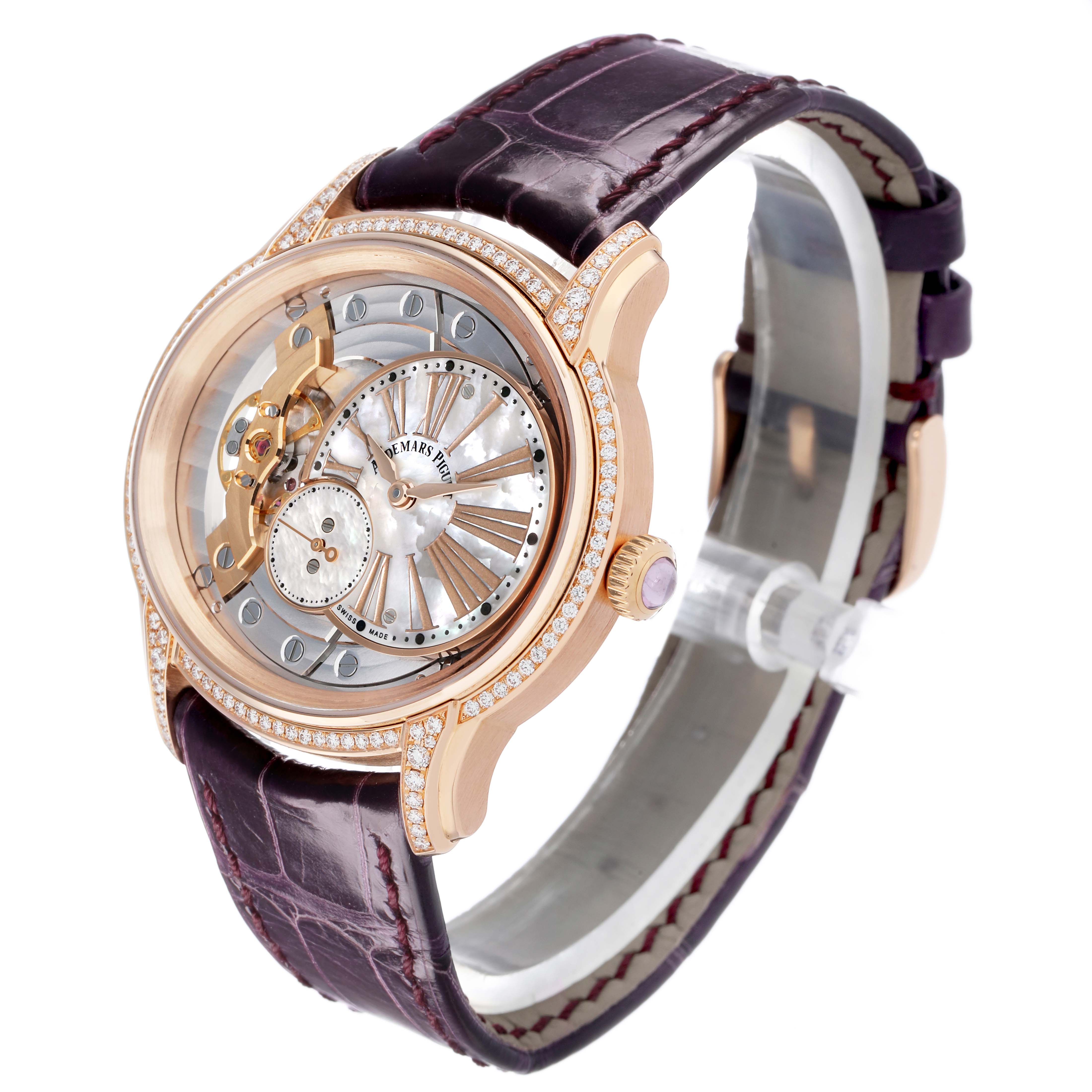 The Audemars Piguet Millenary 77247OR Women's Rose Gold Mother of Pearl Dial watch is shown at an angle highlighting its oval case, open dial, and leather strap.