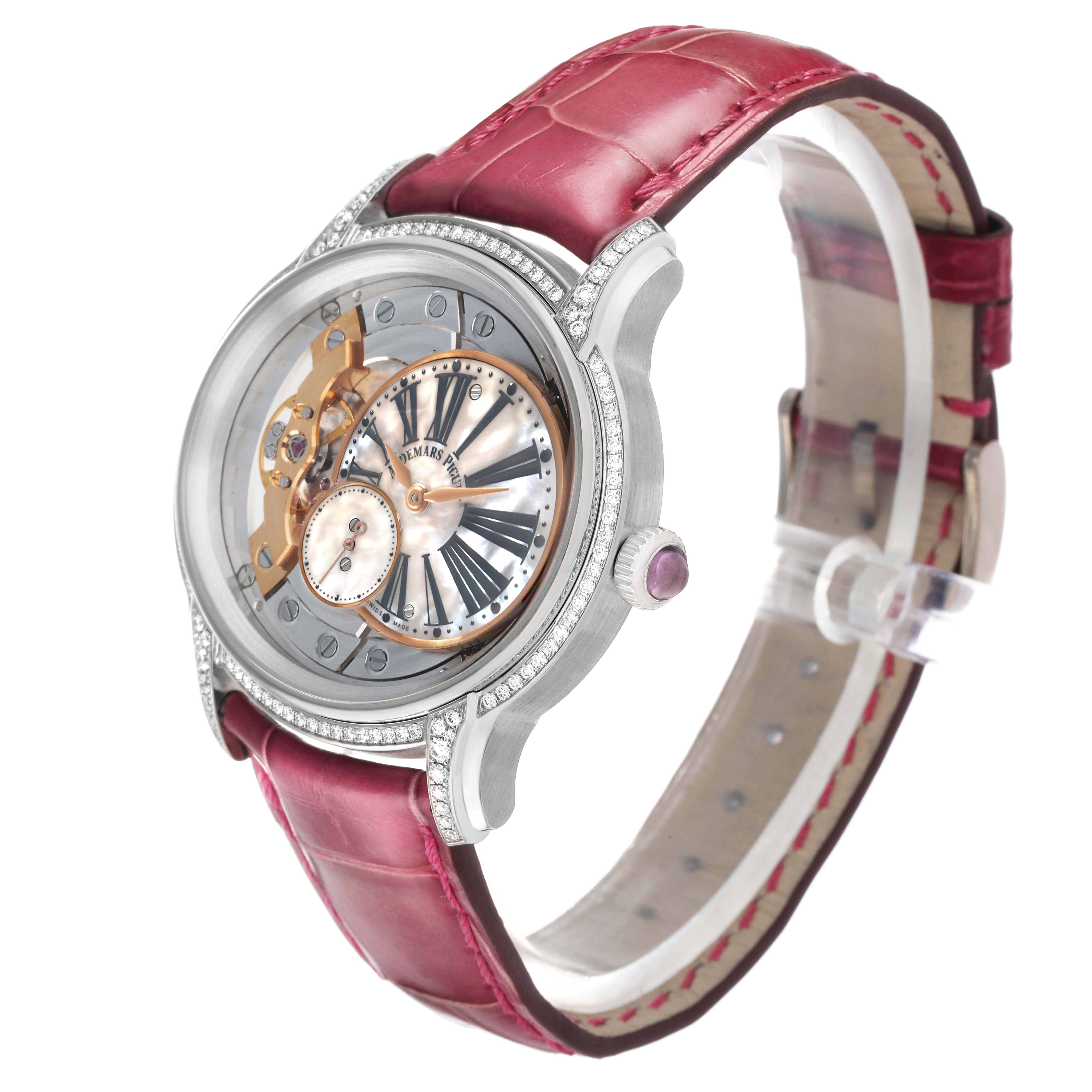 The Audemars Piguet Millenary 77247BC Women's White Gold Mother of Pearl Dial watch is shown at an angled view, highlighting its dial, case, and red strap.