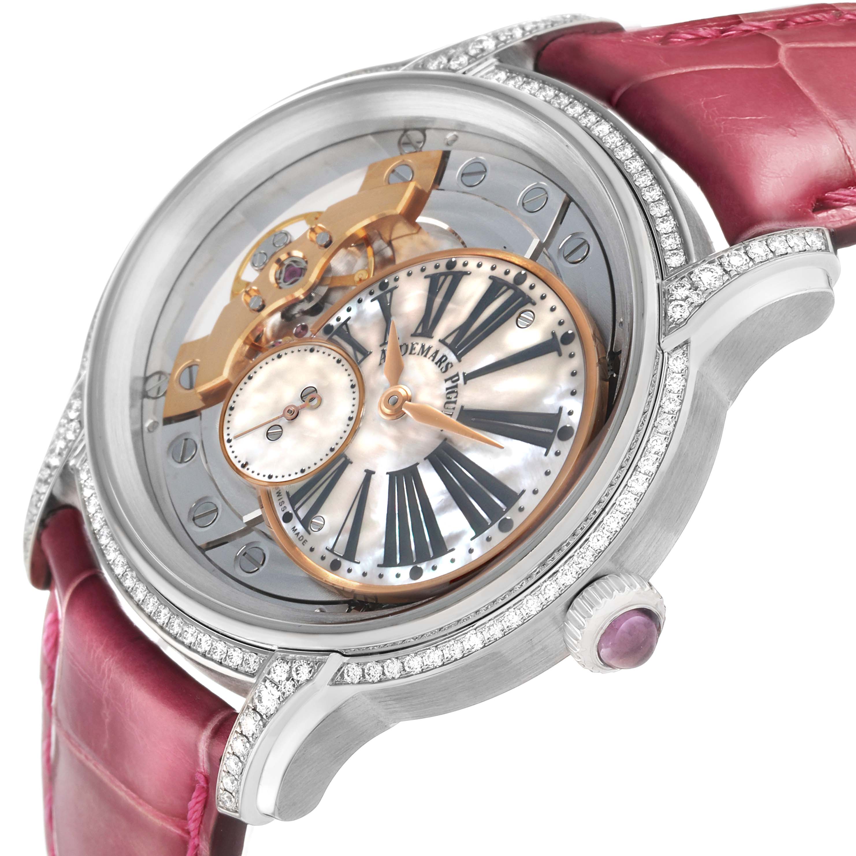 The Audemars Piguet Millenary 77247BC Women's White Gold Mother of Pearl Dial watch is shown at an angled view, revealing the face, crown, lugs, and decorative bezel.