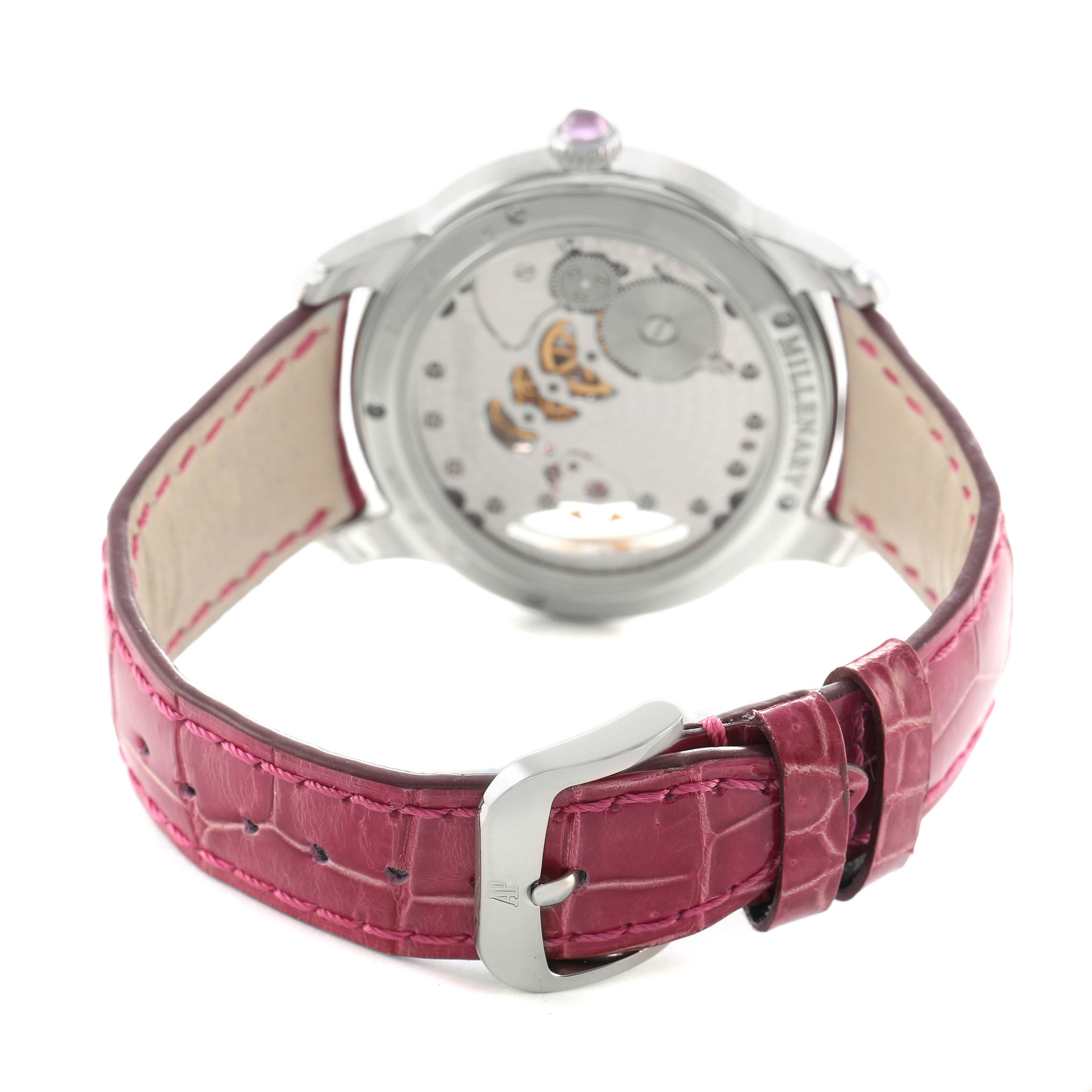 The image shows the back view of an Audemars Piguet Millenary 77247BC Women's White Gold Mother of Pearl Dial watch, highlighting the case back and pink leather strap.