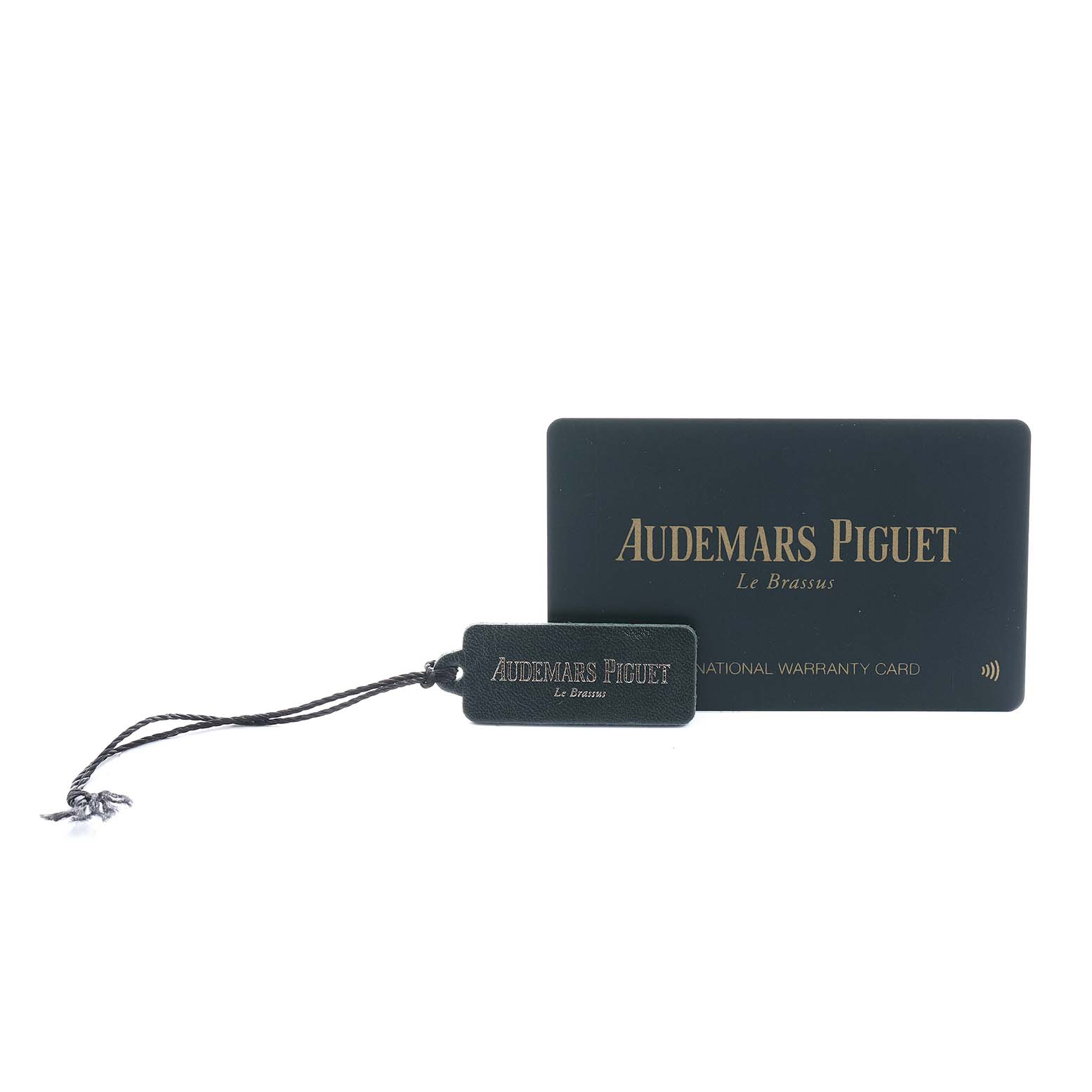 The image shows an Audemars Piguet Millenary 77247BC Women's White Gold Mother of Pearl Dial model warranty card and label, with no watch visible.