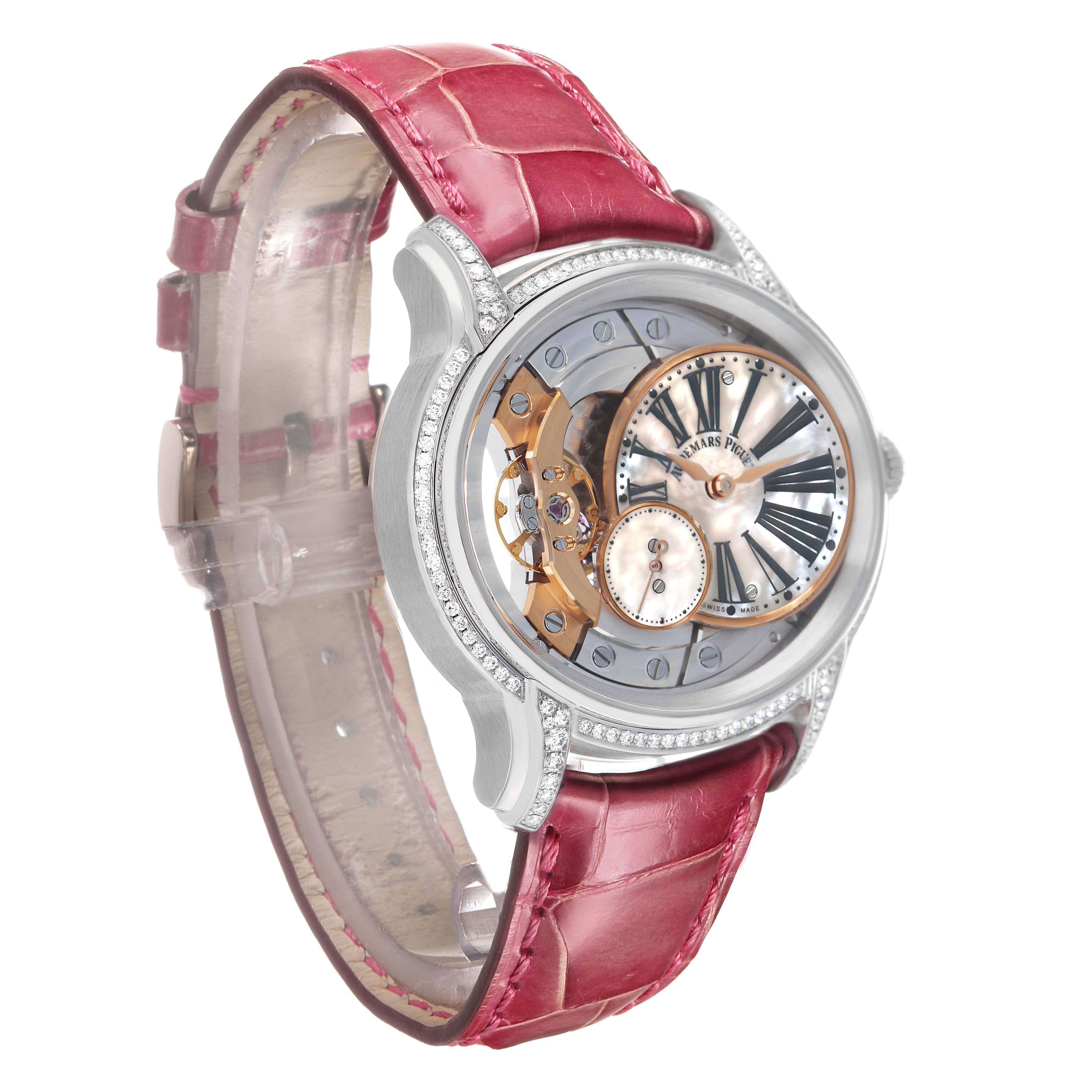 The Audemars Piguet Millenary 77247BC Women's White Gold Mother of Pearl Dial is shown at an angled side view, highlighting the case, dial details, and red leather strap.