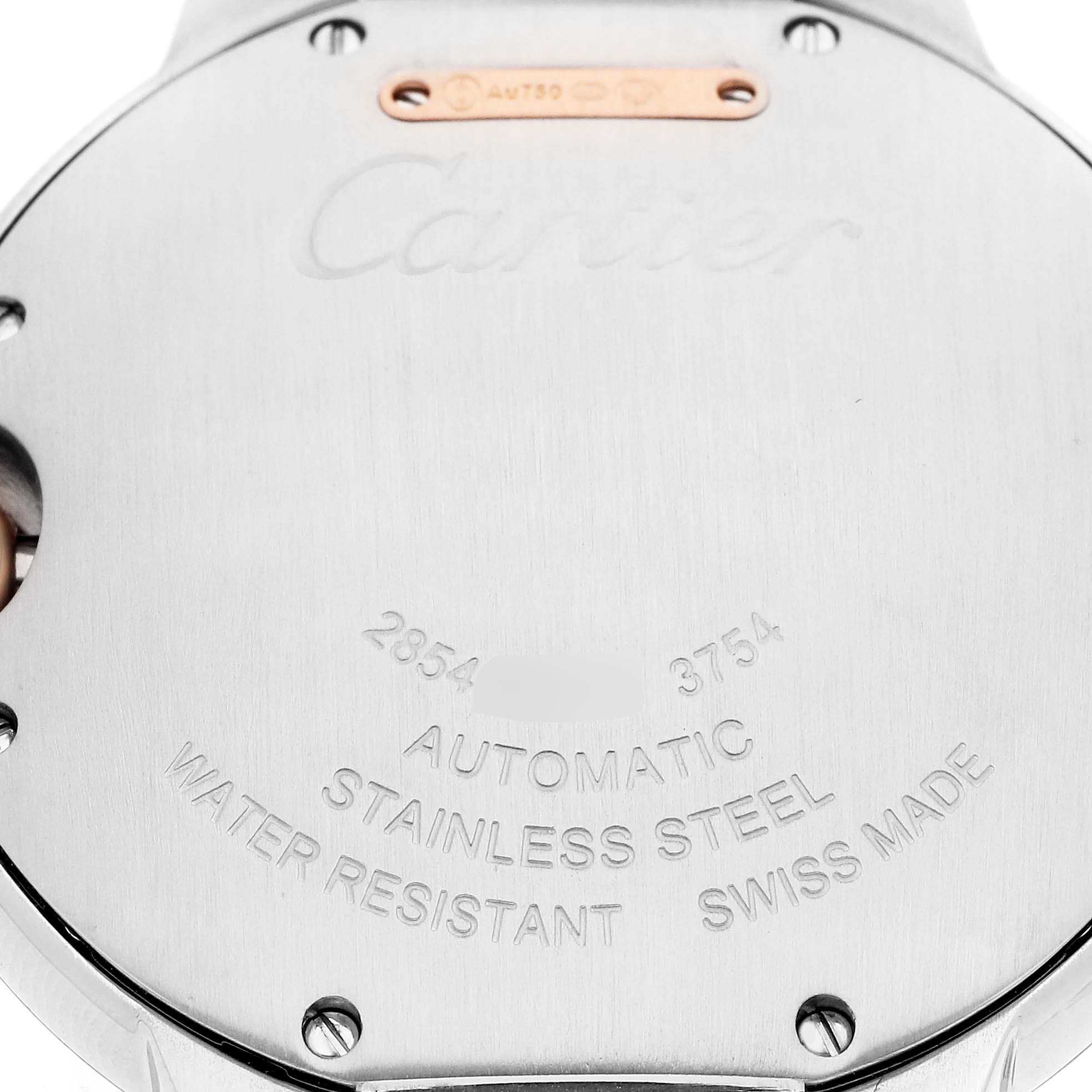 The image shows the back of a Cartier Ballon Bleu WE902081 Women's Steel and Gold (two tone) Silver Dial watch, highlighting engravings and the case material.