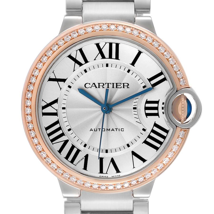 The Cartier Ballon Bleu WE902081 Women's Steel and Gold (two tone) Silver Dial watch is shown from a front angle, featuring the dial, Roman numerals, and diamond-set bezel.